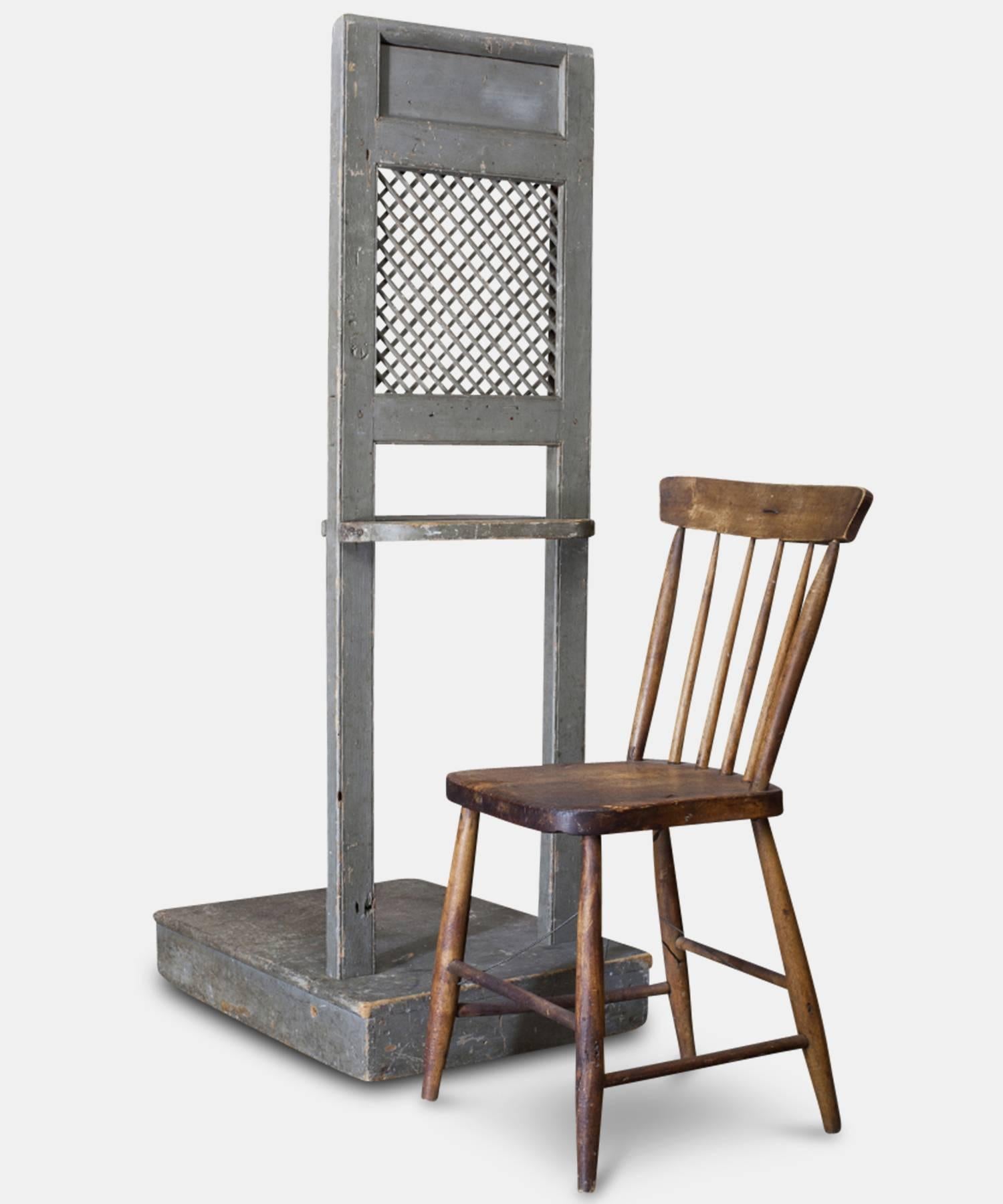 Unusual piece with original painted surface and simple chair, the base removes from the confessional wall for easy transport.

Made in America, circa 1920.