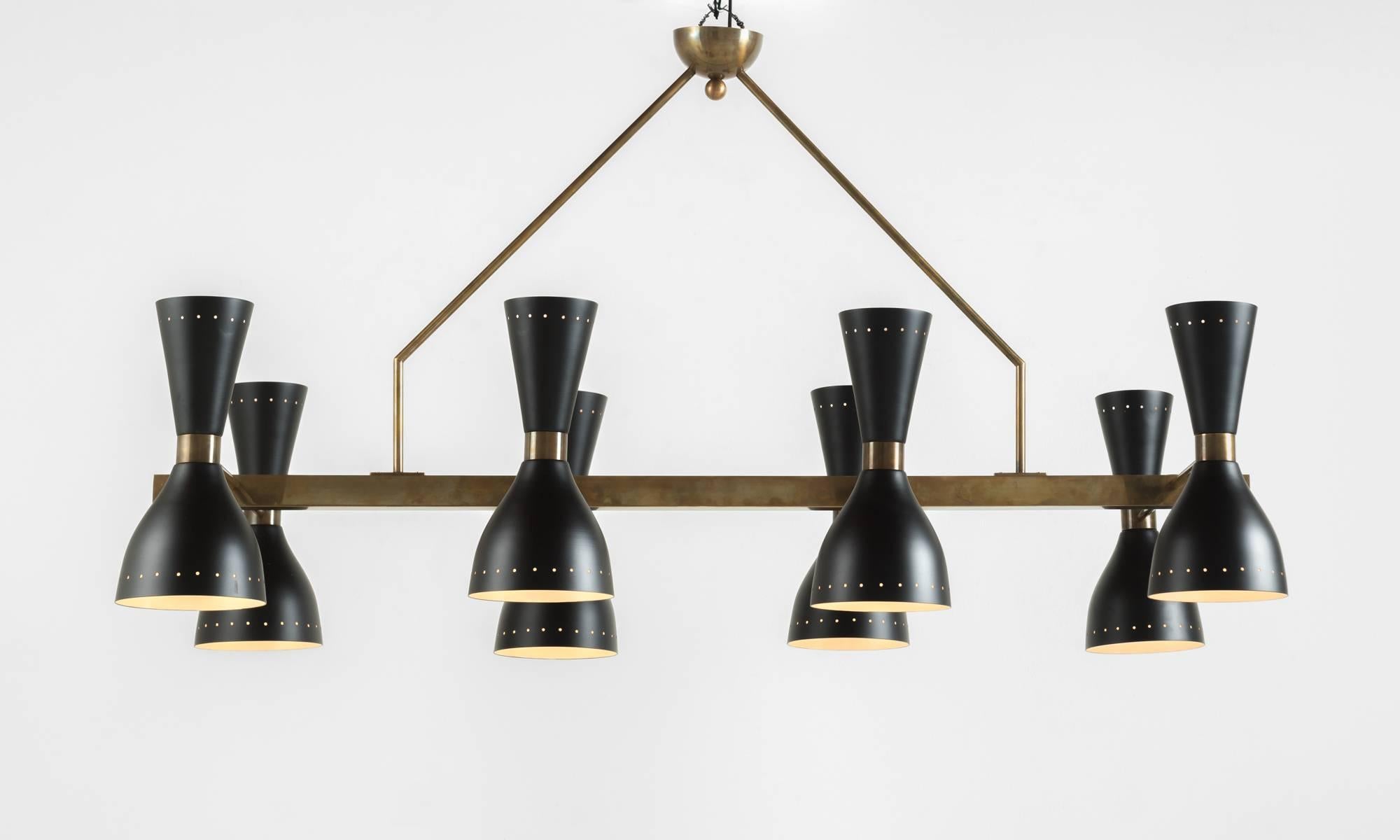 Black & Brass Eight Shade Chandelier  
Made in Italy
Rectangular form with brass hardware and eight black painted metal shades.
55