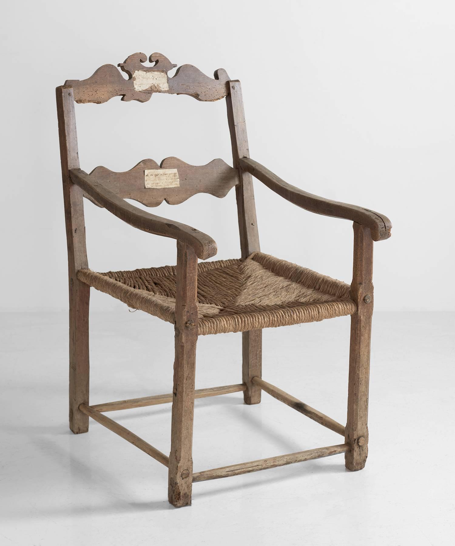 Oversized oak and rush seat farm chair, Italy, circa 1720.

Rush seated farm chair with oak frame, unusually tall and deep.