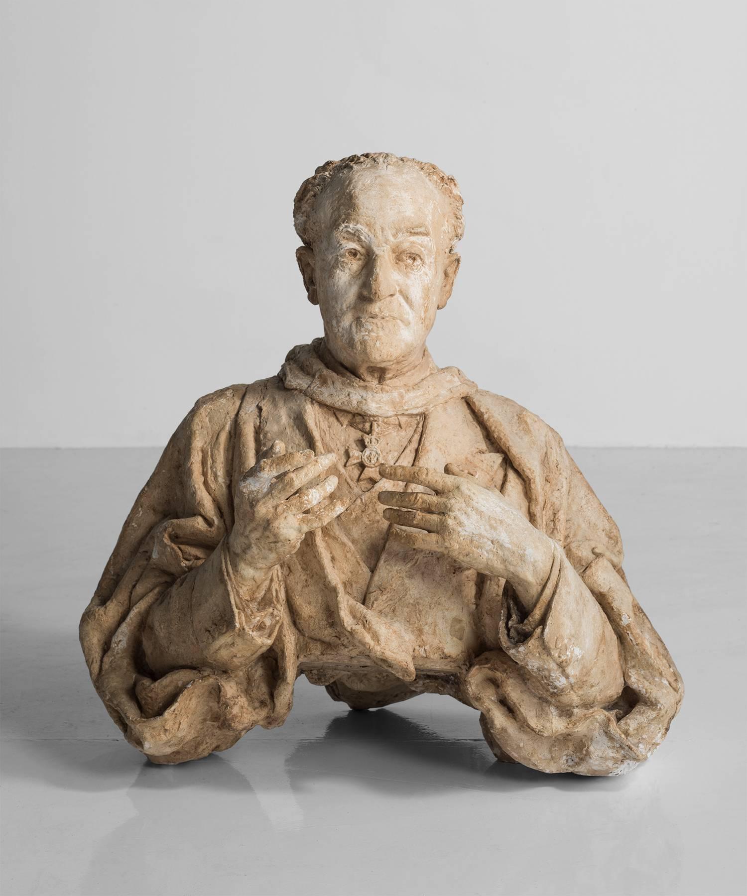 Plaster bust of a priest by Maurice Lambert, circa 1950.

        