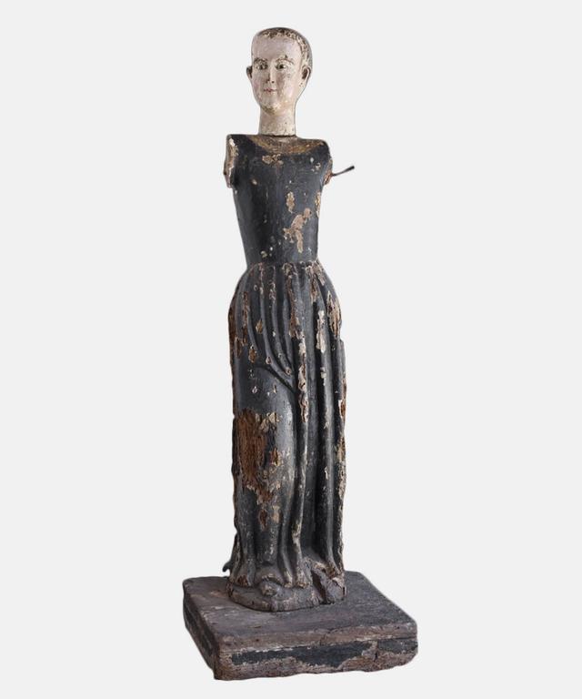 Wonderfully carved Italian saint with original black pain.

Made in Italy, circa 1760.
