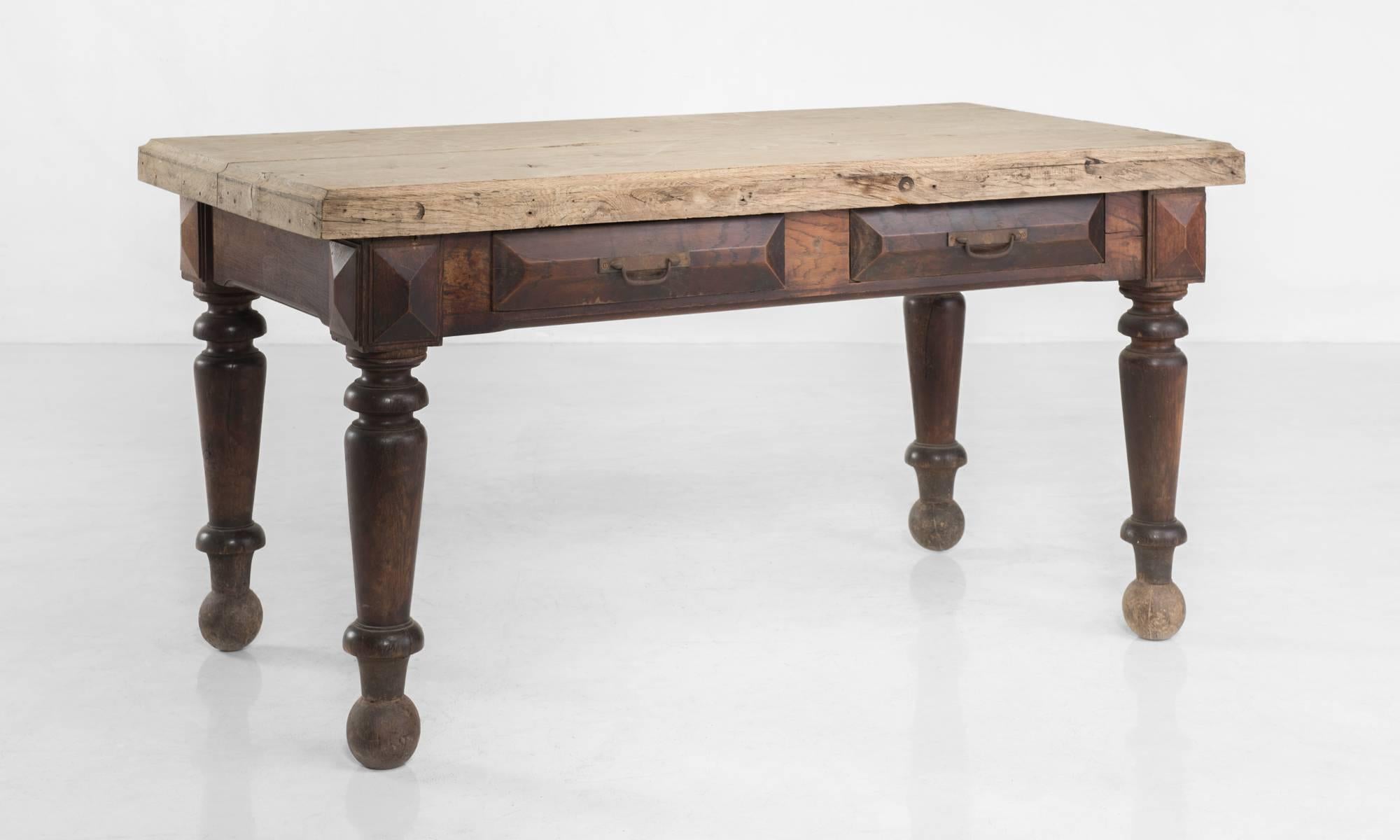 French Oak Kitchen Table with Drawers, circa 1790.

Substantial form with scrubbed oak top, two drawers, all in original finish.