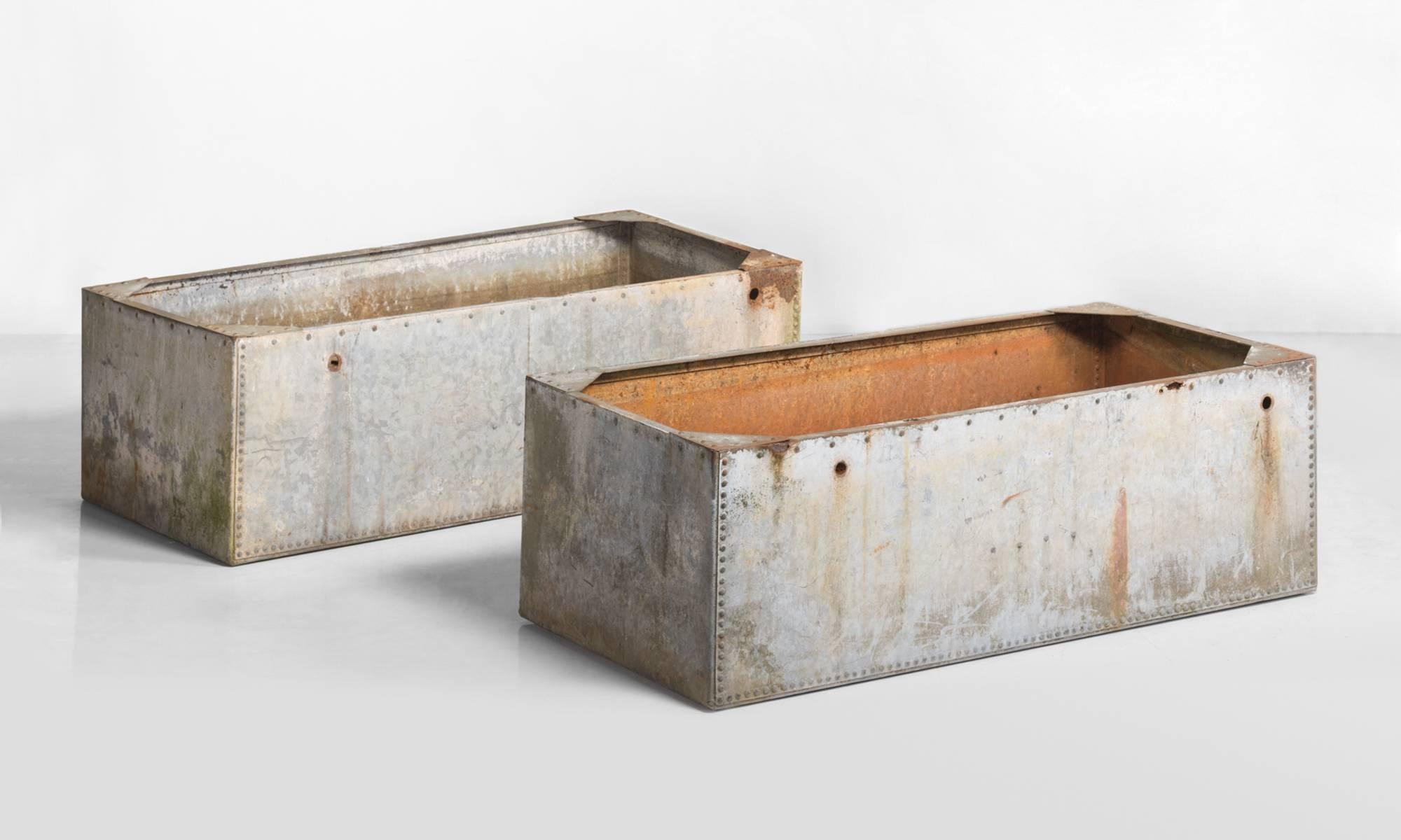 Galvanized metal trough, circa 1950.

Large studded metal troughs with wonderful patina, repurposed as planters.