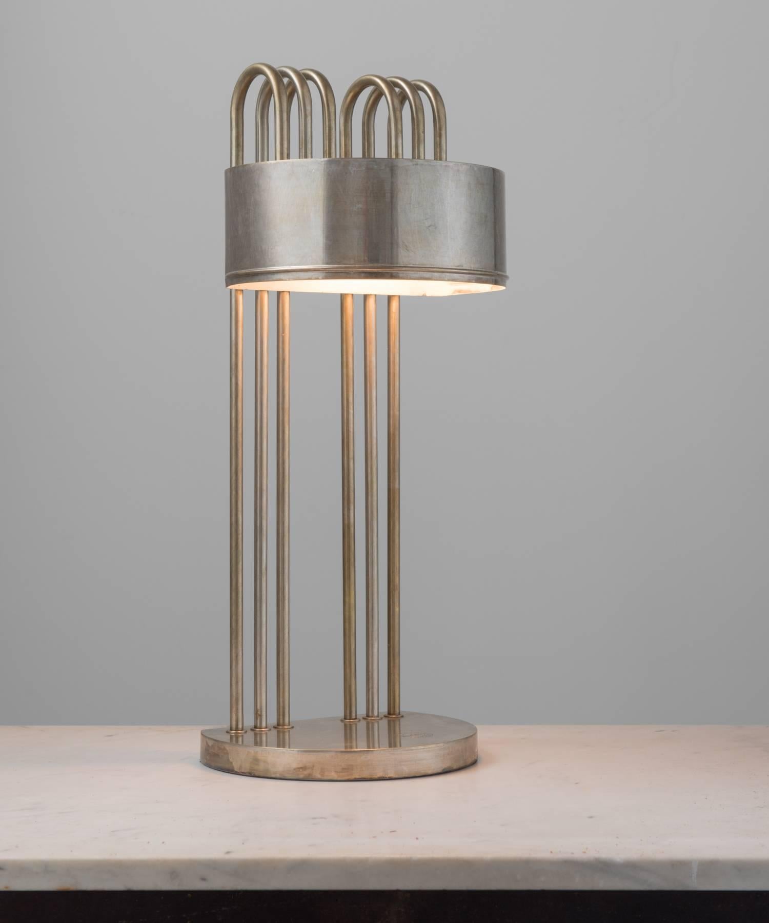 Marcel Breuer desk lamp, made in Germany, circa 1925.

Created for the International exposition of modern Industrial and decorative arts, in Paris, brass plated nickel and stamped “Exposition Paris, 1925”.
