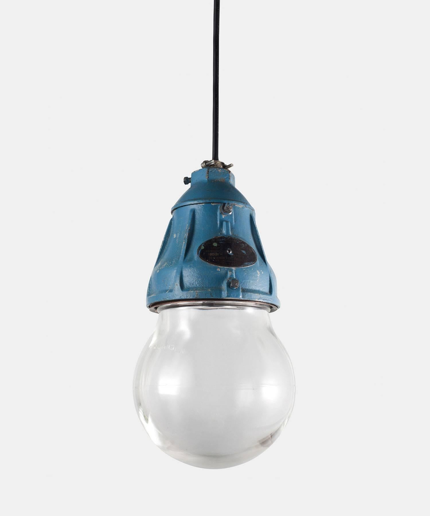 Type II G factory pendant with heavy iron fitter in original blue or grey paint. 6-inch embossed glass globe. Industrial era American design.

*Please Note: This fixture is newly wired, but not UL Listed. Standard Lead Time is 2-3 Weeks*

*Please