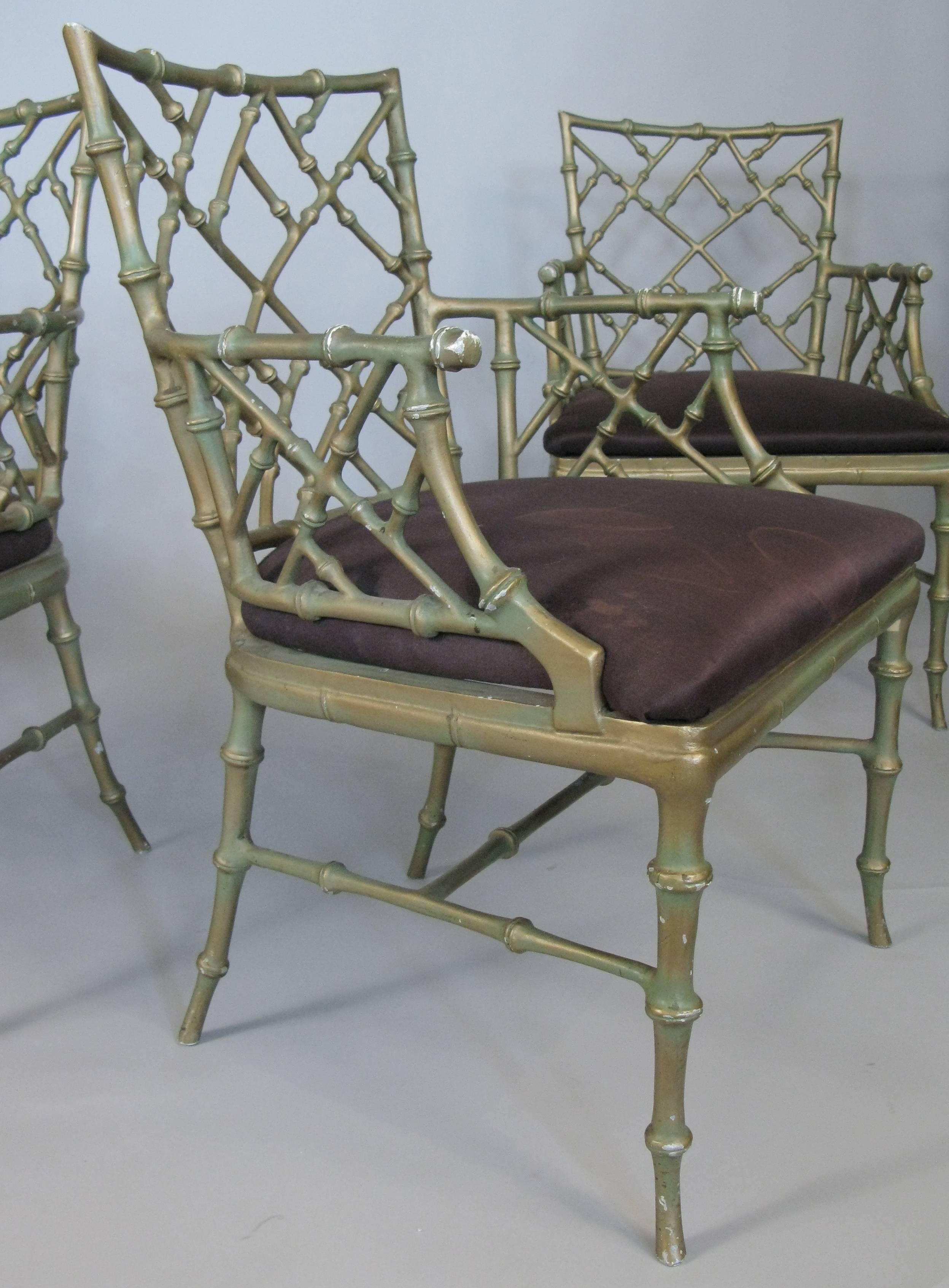 A very nice matched set of four cast metal 'bamboo' armchairs designed by Phyllis Morris. Beautiful Classic design in these very well made armchairs with wonderful details. Original gold wash finish is worn, and the upholstery will need to be