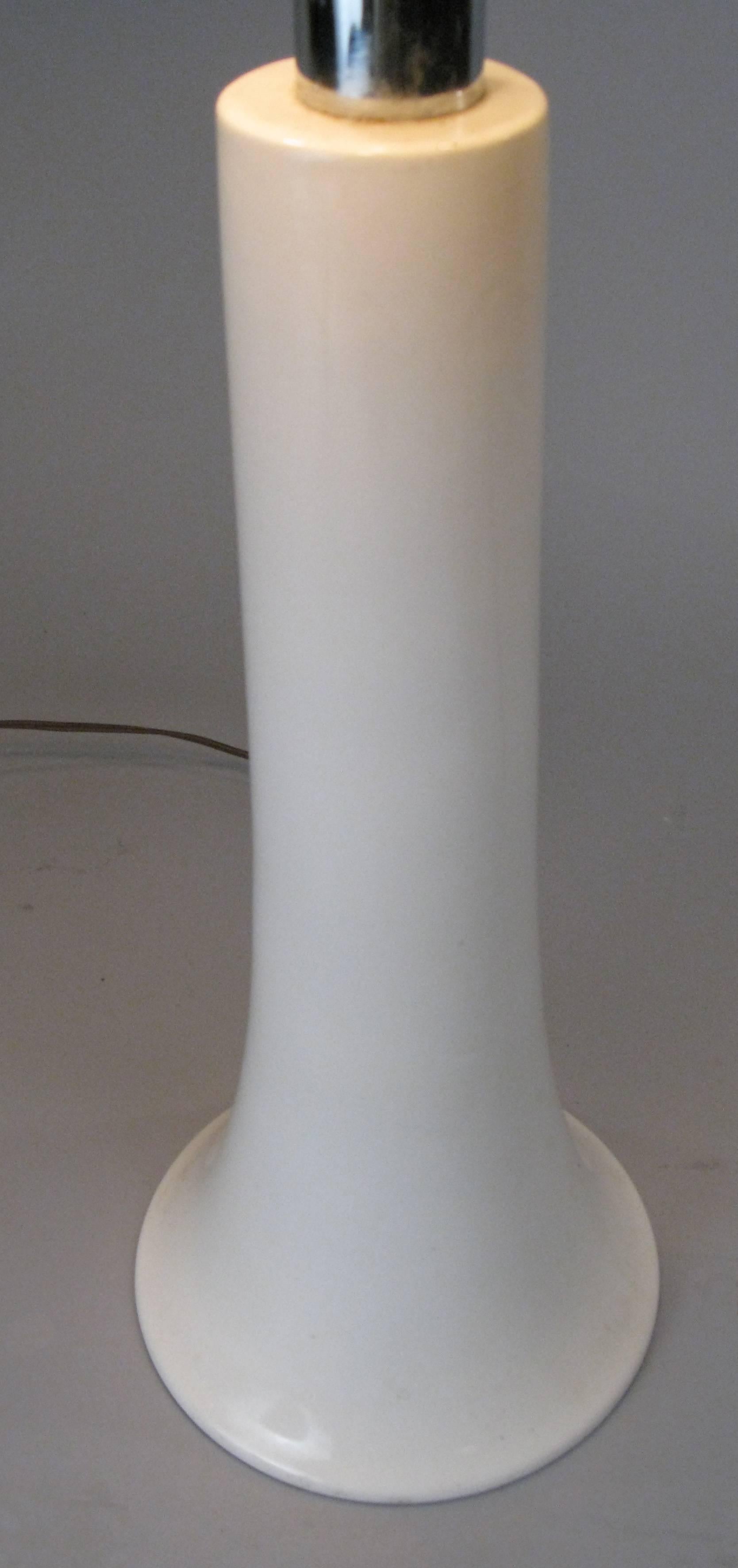 A very handsome vintage 1950s, Italian table lamp with spare cylindrical white ceramic center with a flared base. With fitting for 3 bulbs for varying degrees of light, and with its original metal shade with brown flocked surface. A very unique and