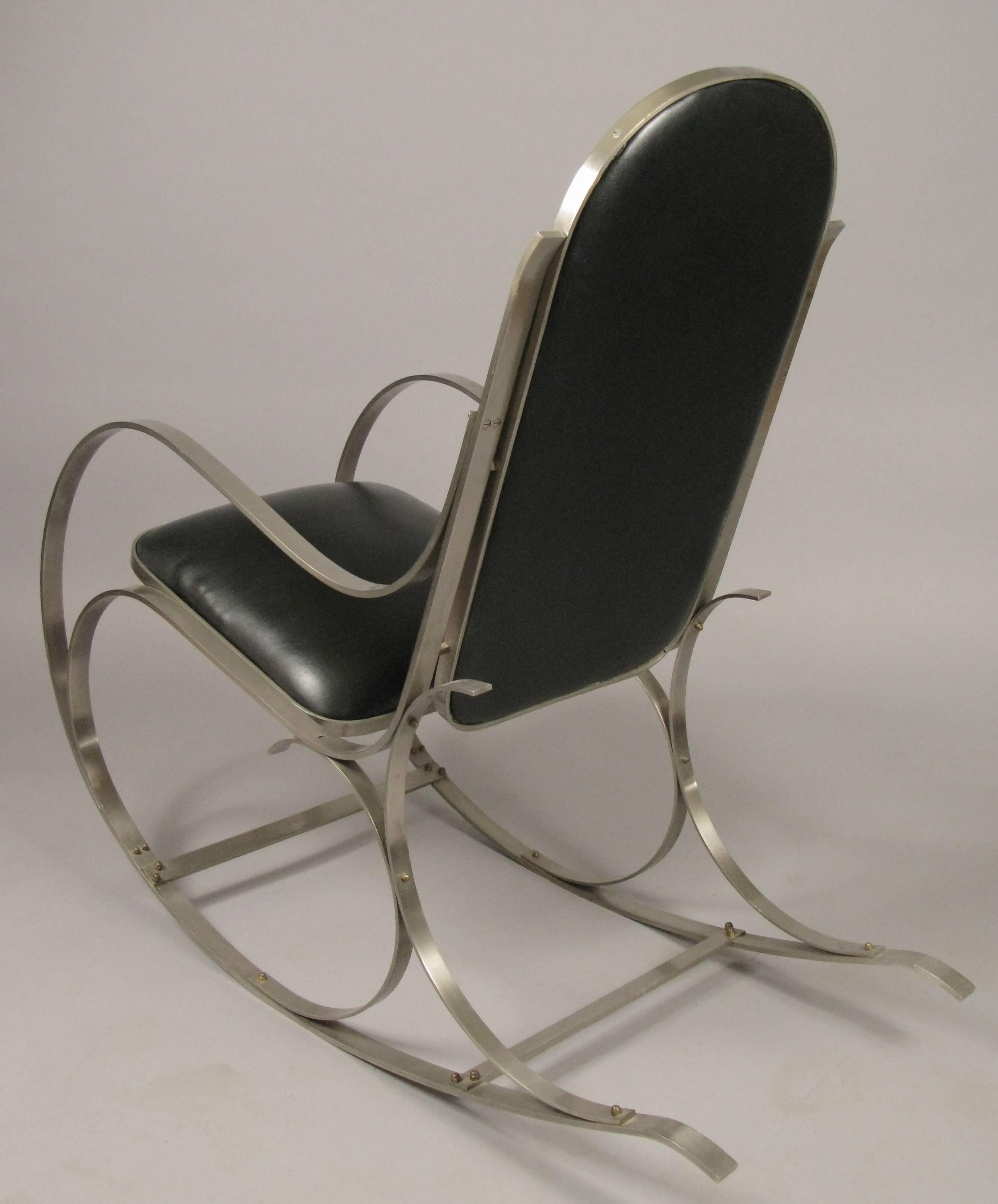 An incredibly well made vintage 1970s brushed steel frame rocking chair. Stamped 'made in Italy'. Excellent condition.