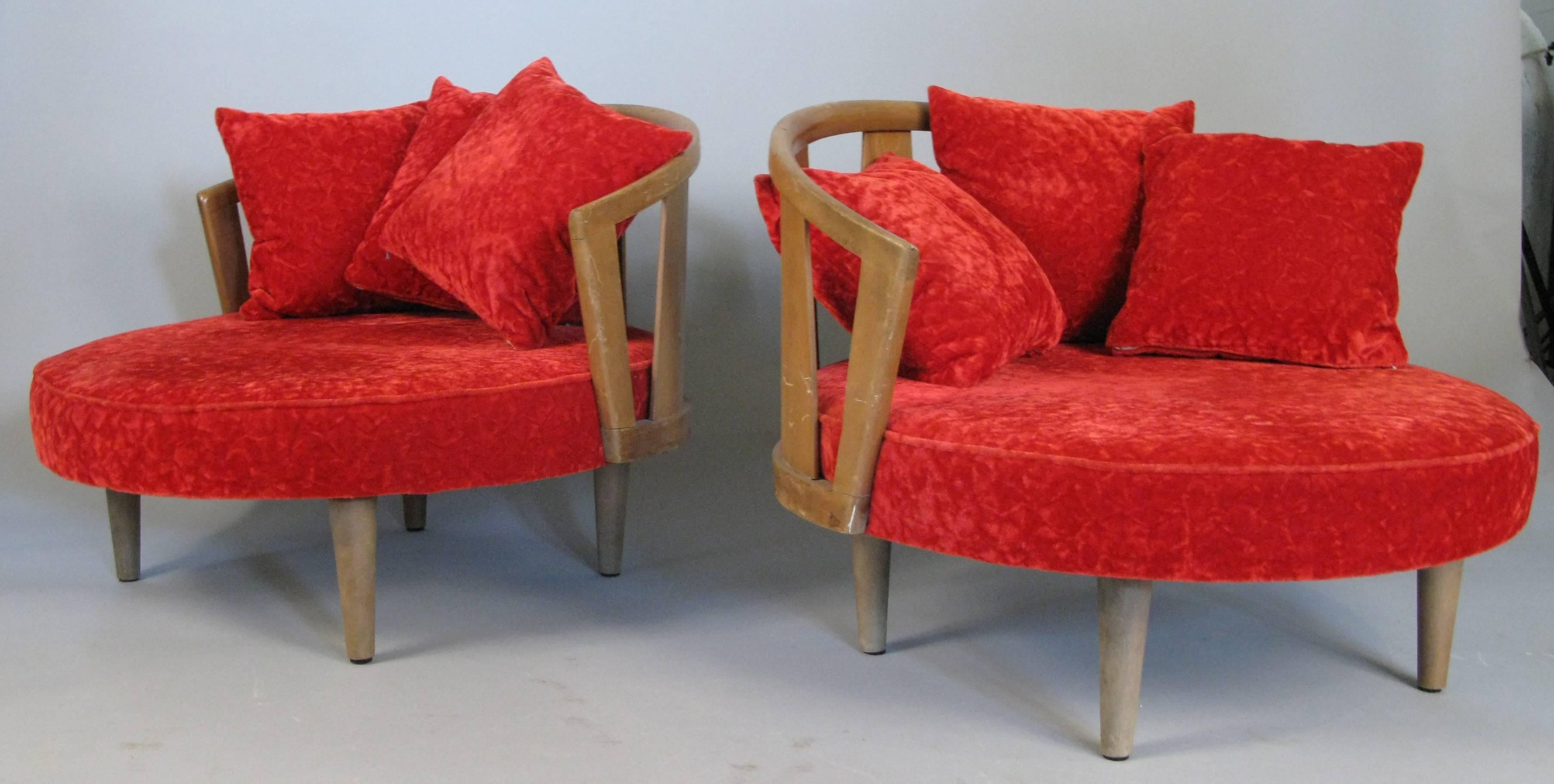 A pair of very cool 1960s modern circular lounge chairs by Adrian Pearsall for Craft Associates, with upholstered seats, curved walnut backs and loose cushions, in original condition.