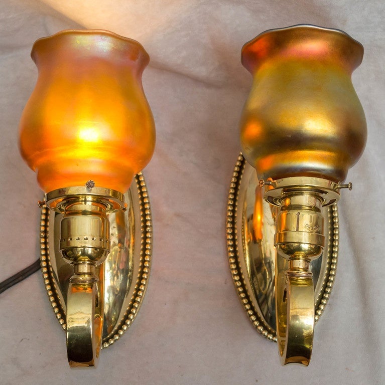 We rarely polish our lighting, but we had a feeling that these sconces would look fabulous polished. We think we made the right call. The metal work here is not done with cheap materials. All of the parts except the shade holder are cast, not thin