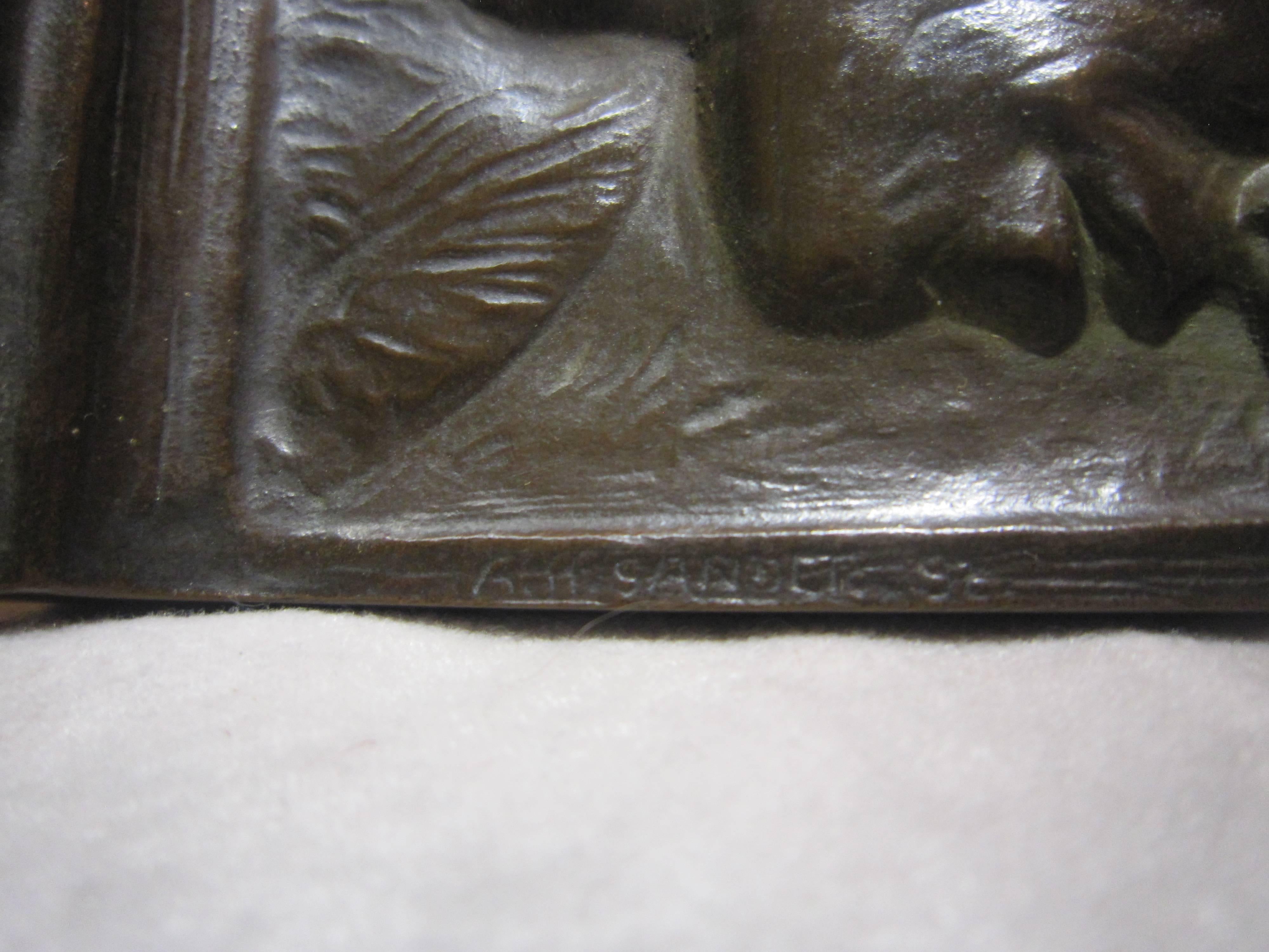 These richly patinated and well cast bronze bookends are artist signed and bear the foundry mark 