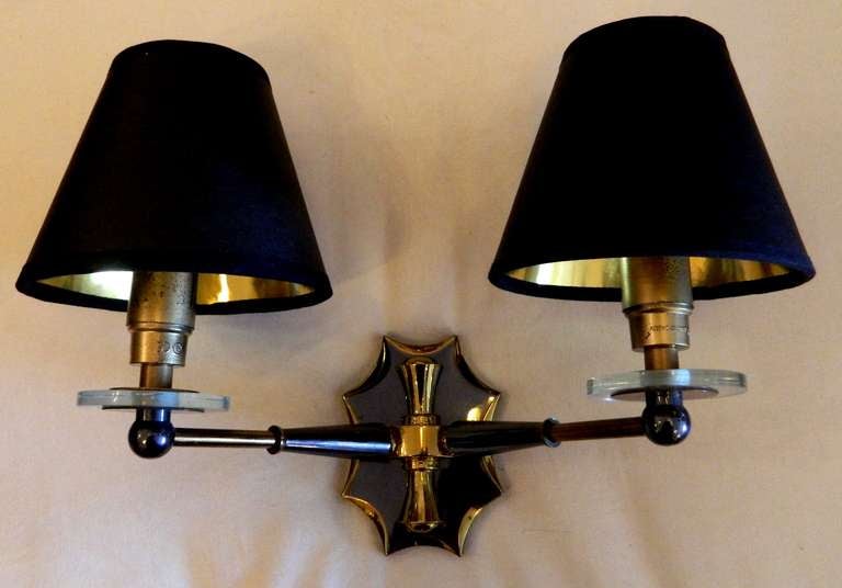 Two patinas pair of sconces, brass and gun metal, circa 1955s
Measurements with the shade: 12