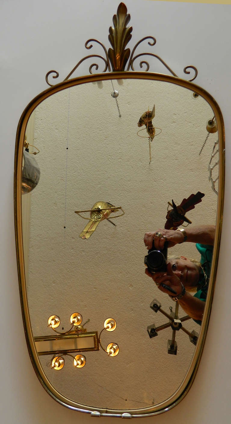 Italian shield mirror, circa 1950.