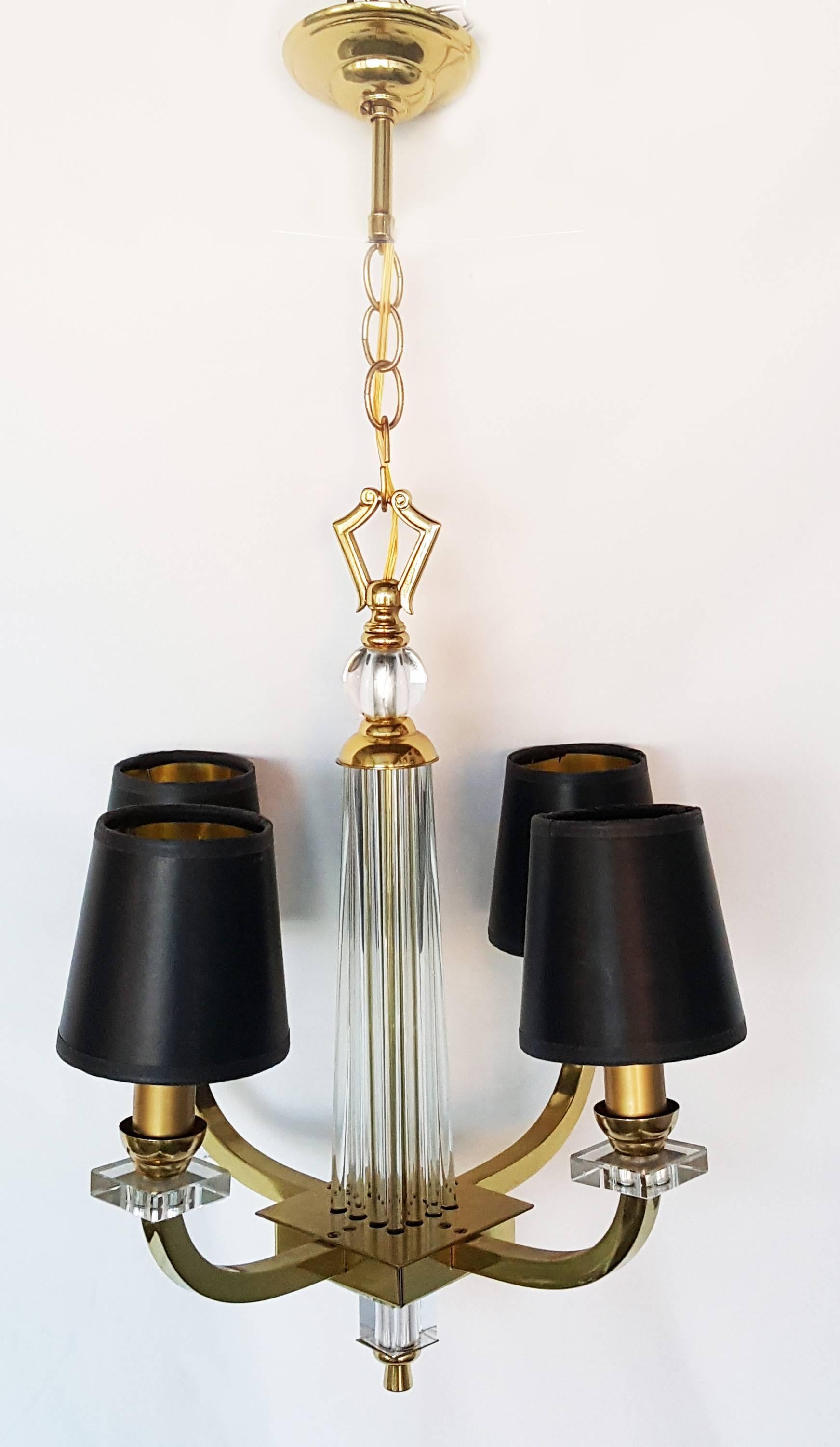 Brass Pair of 5-light Jacques Adnet Chandeliers