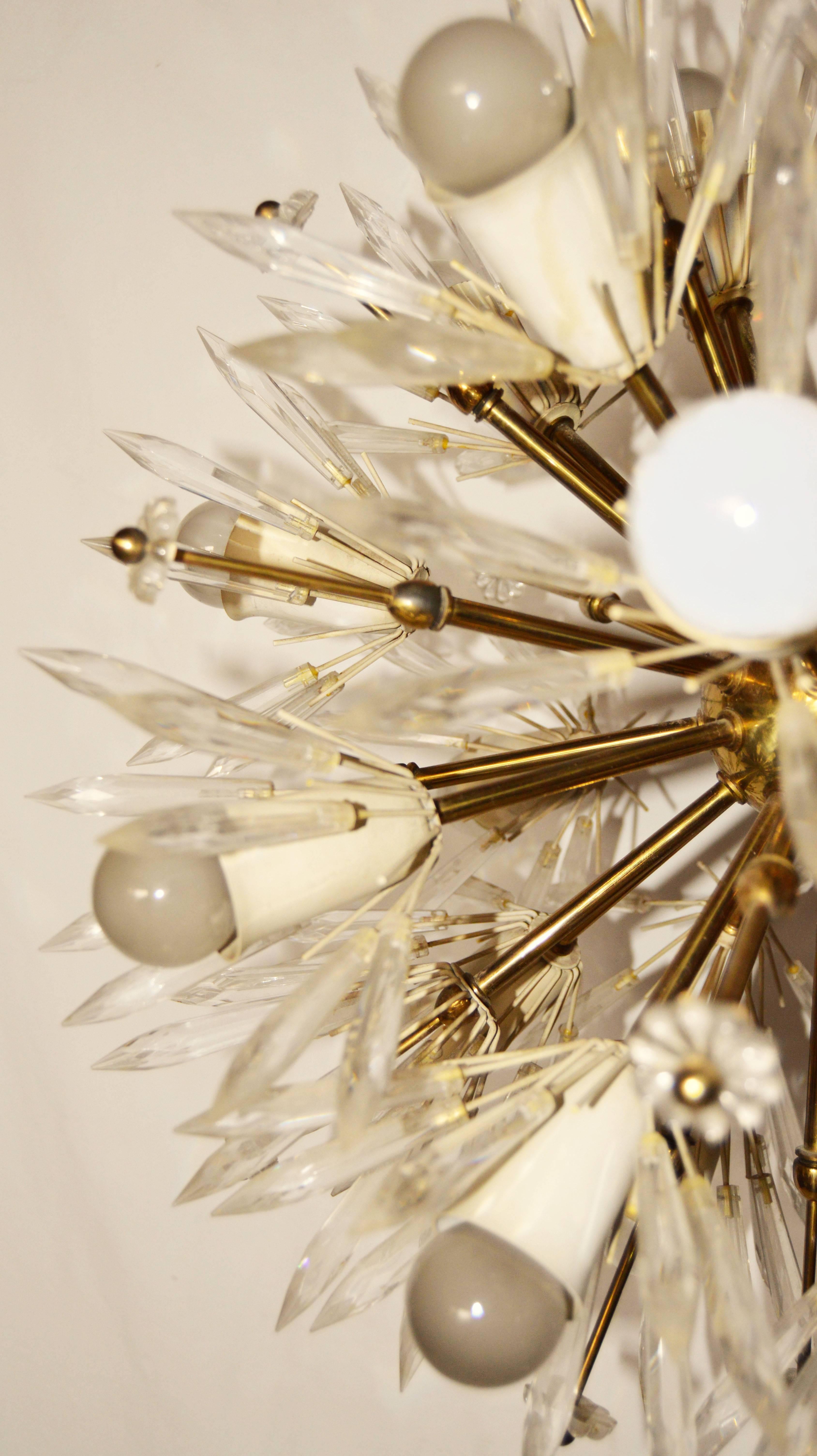 A rare example of Emil Stejnar Sputnik chandelier 20 lights,
25 watts per light.
 