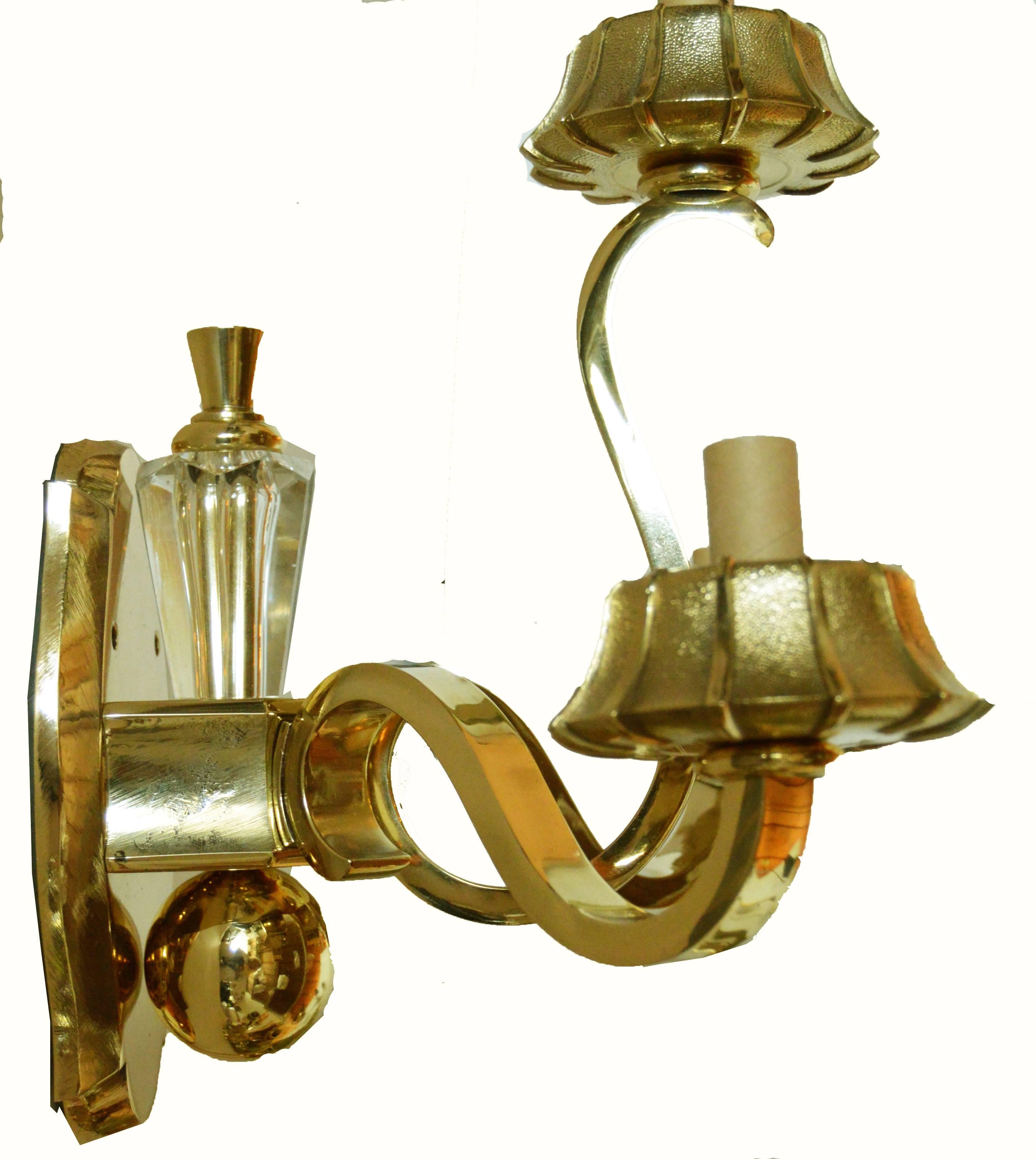 Superb gold-plated pair of two arms sconces by Maison Sabino and Cristallerie de Sevres .
US rewired and in working condition.
Two lights , 40 watts max per bulb.
Back plate dimension : 7.5 H , 4 W.
We also have a three arms and five arms pair