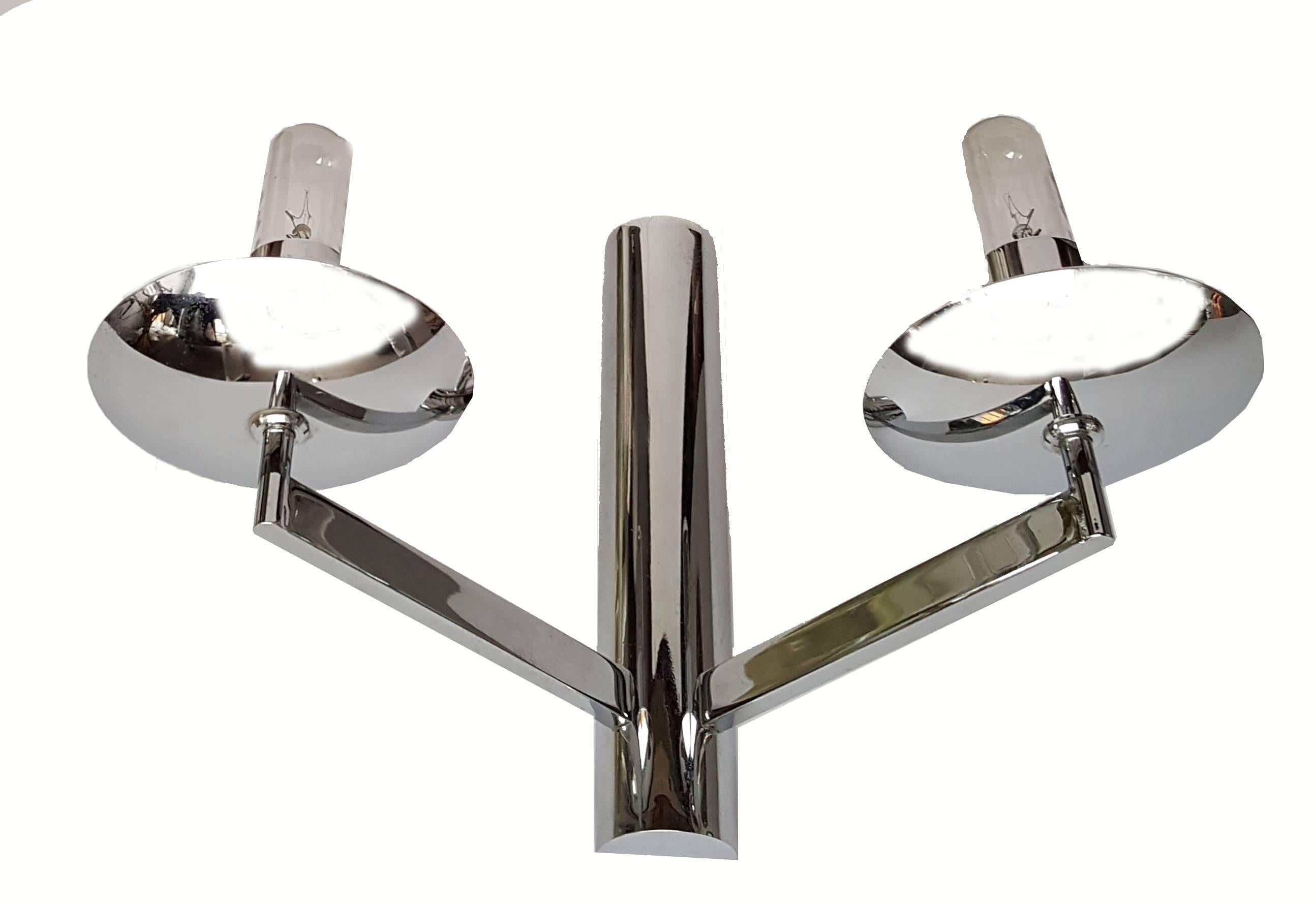 Nice pair of two-arm Sciolari sconces, wall lamps in Nickel made in Italy.
US Rewiring and each Light takes 2 light bulbs with 60 watts.
Mid-Century Modern Lighting ready for a new Home.
Three pair available.
Please take a look at our large