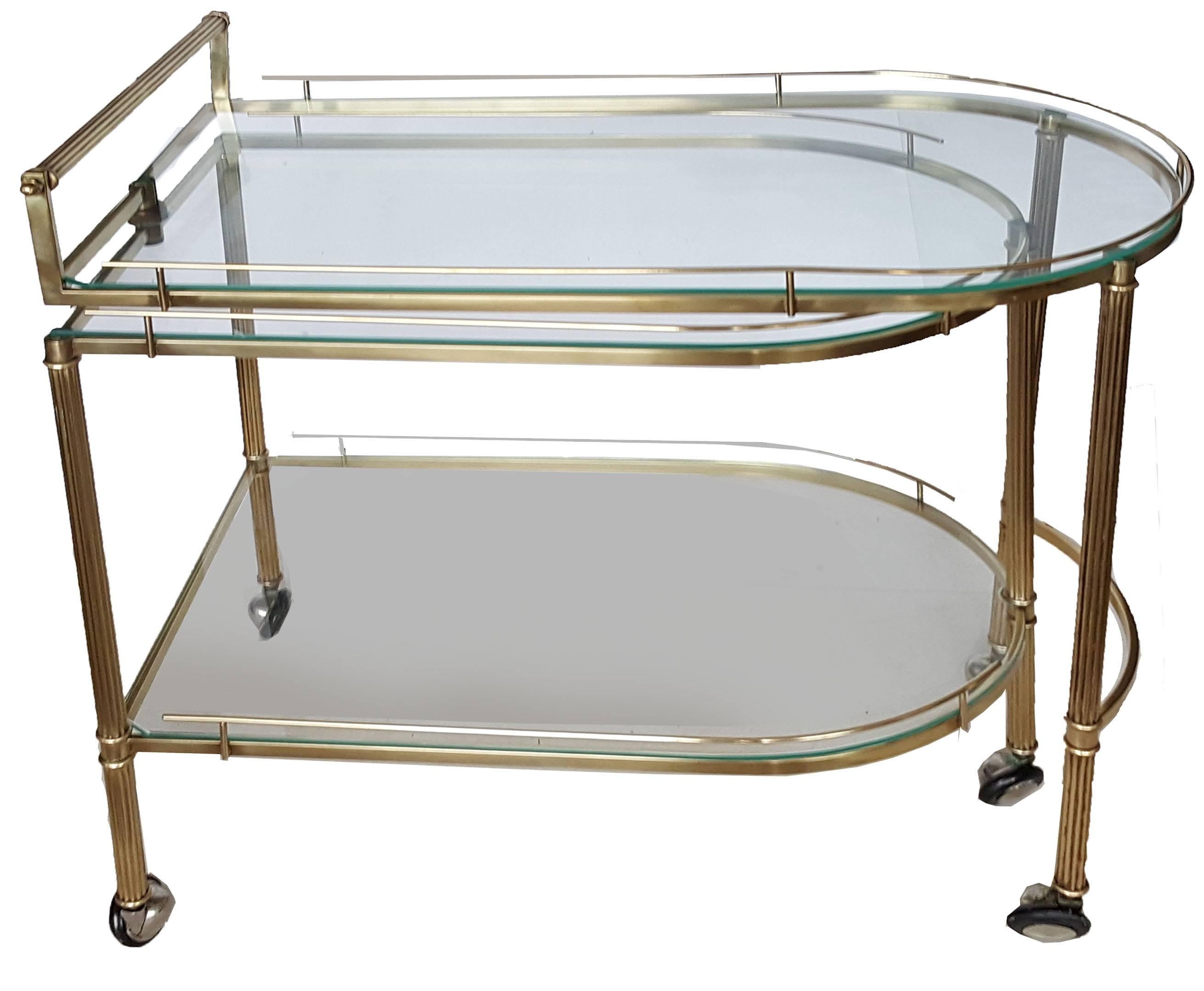 Superb brass articulated Italian bar cart, three-level.