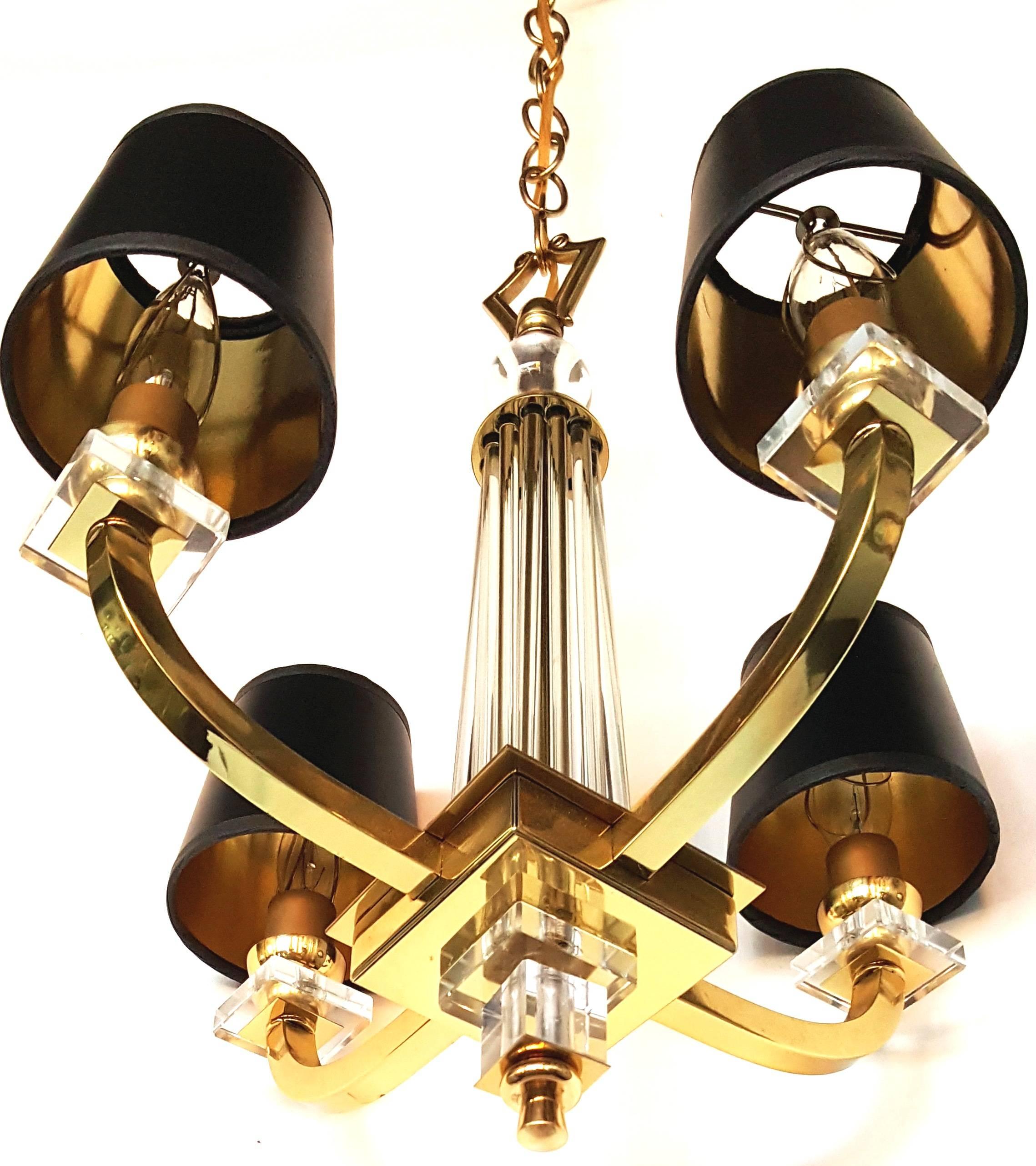 Superb pair of chandelier in the style of Jacques Adnet, brass frame and glass
Rods
four lights, 75 watts per light.
US rewired and in working condition
Two pairs available. Priced by pair.

