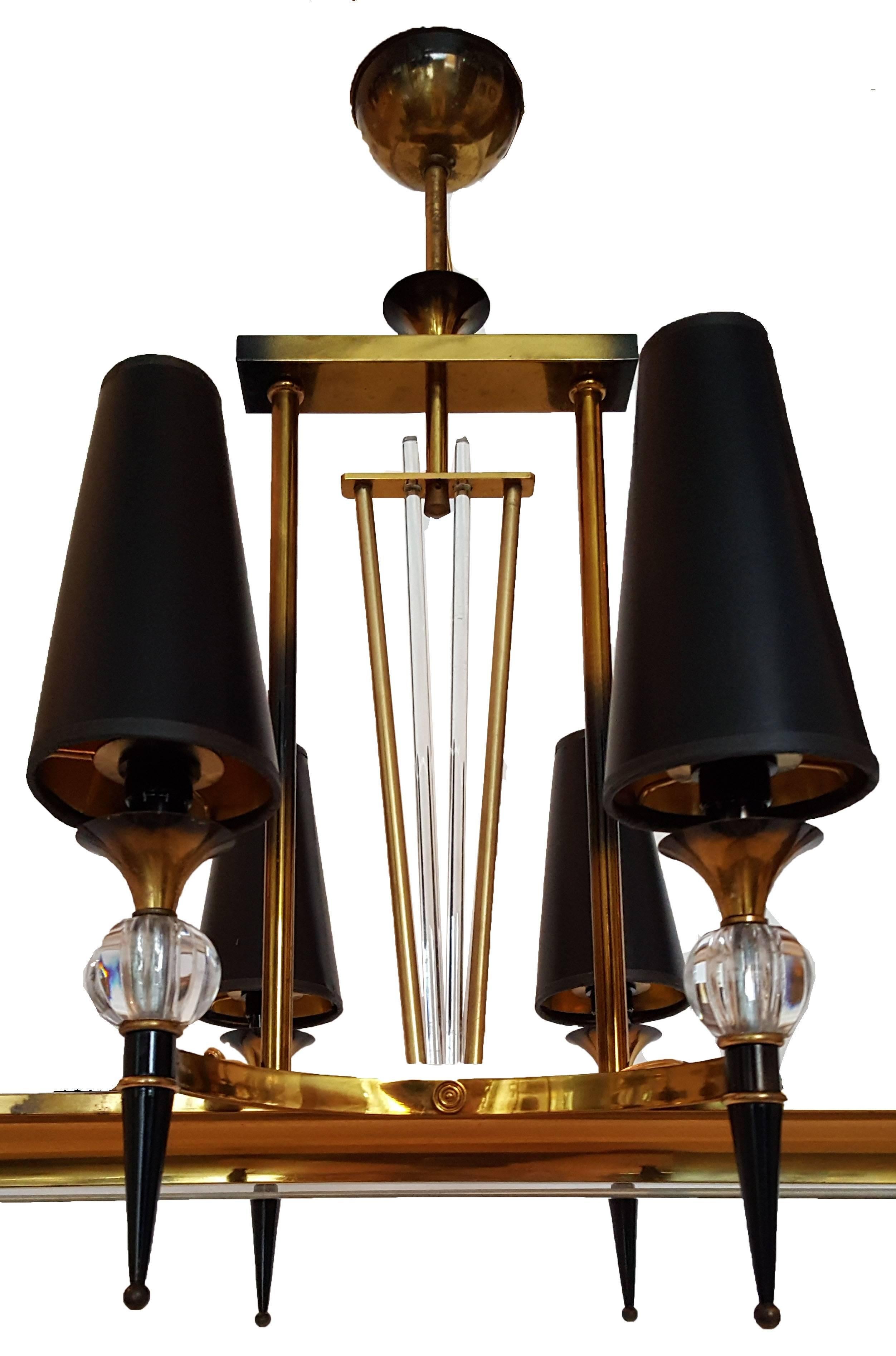 Superb Jacques Adnet ten lights chandelier, two patina brass and glass ball and rods.
US rewired and in working condition.
40 watts and 60 watts sockets.