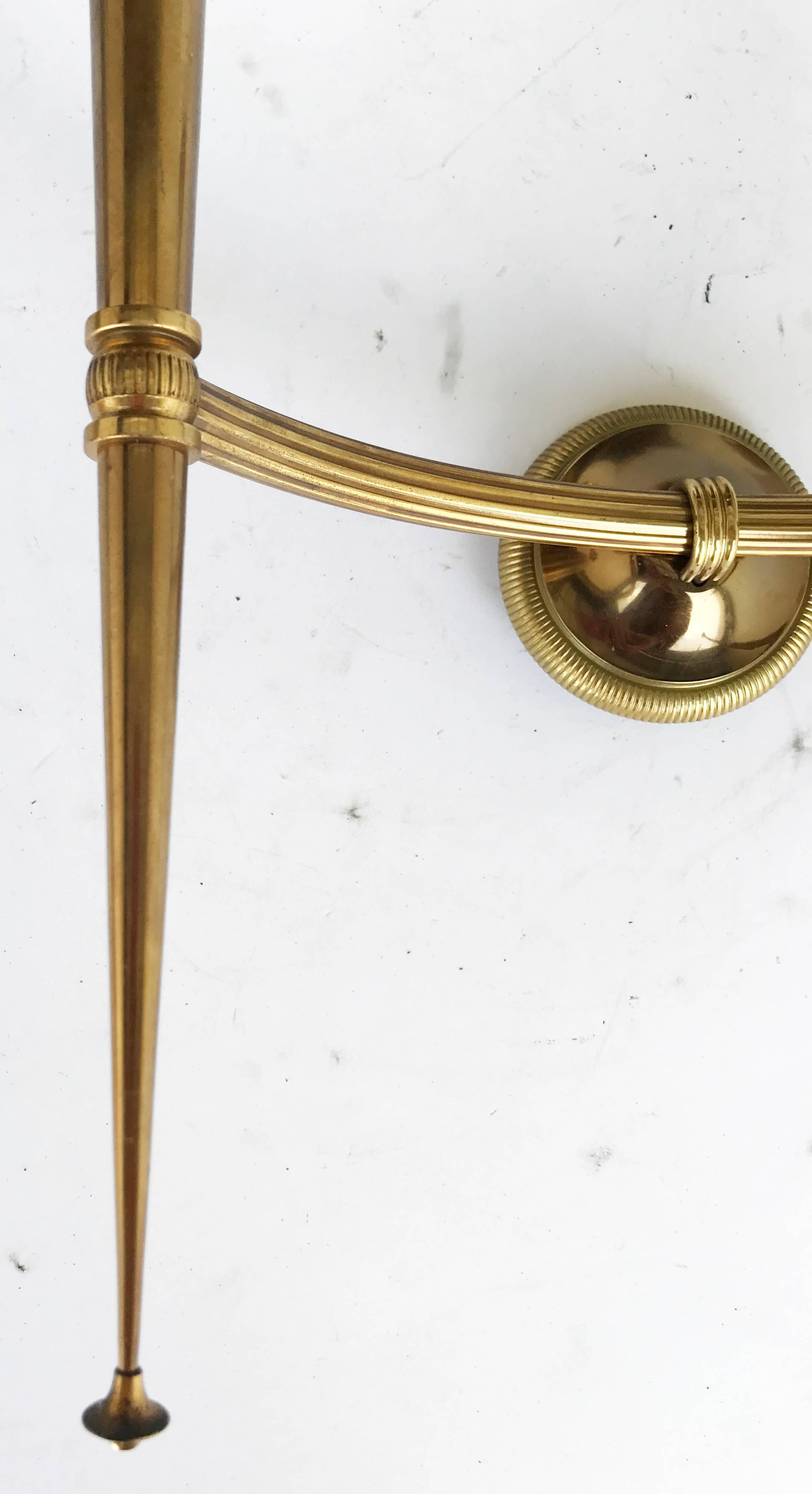 Superb pair of two arms sconces, probably retailed by Maison Jansen, circa 1970, two patina bronze and brass, opaline glass ball, 5 inches diameter
Two lights, 40 watts max bulb
US rewired and in working condition
Backplate diameter 2 3/4