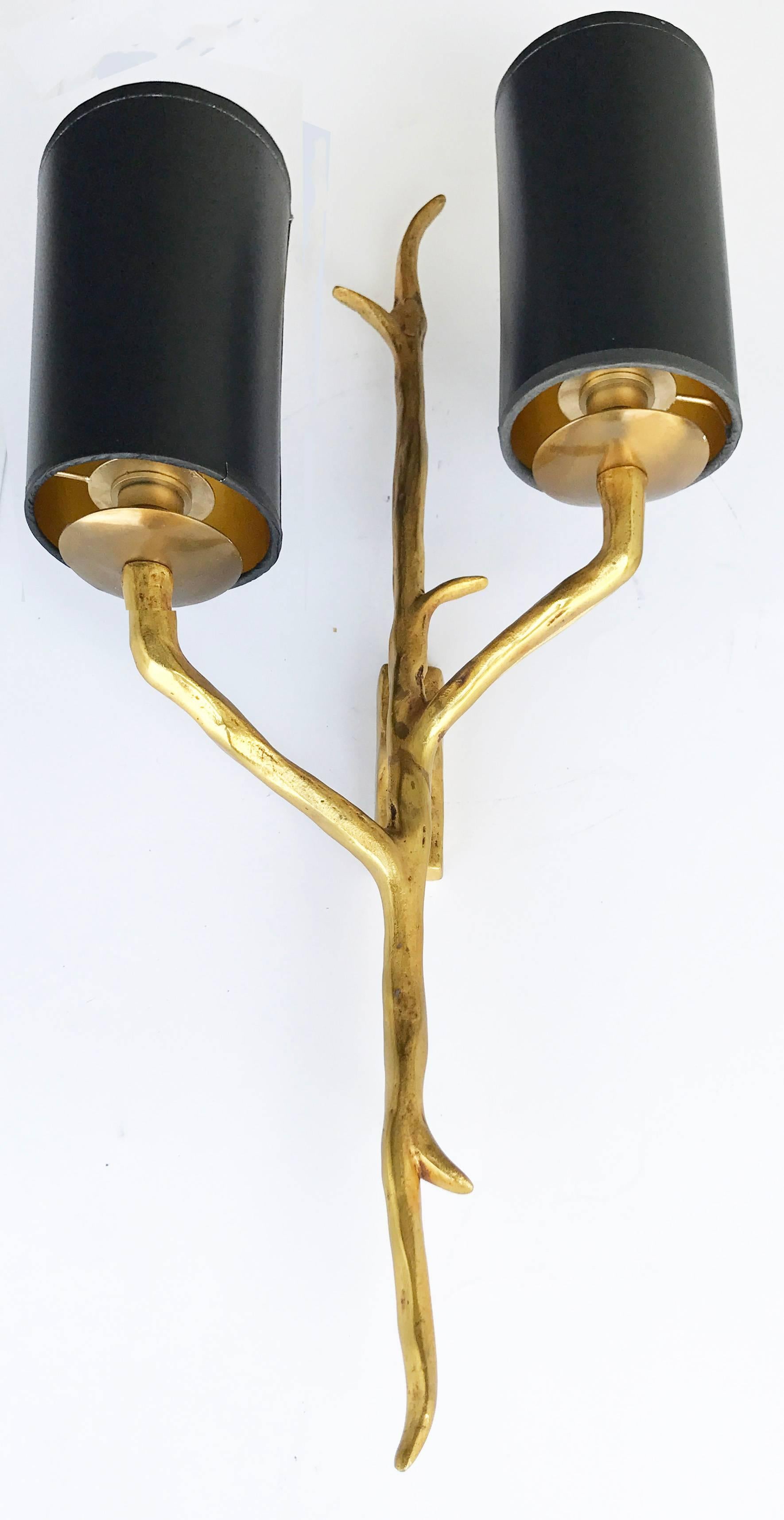 Superb pair of Agostini style bronze sconces
Two lights, 85 watt max per bulb
US rewired and in working condition
Back plate dimension: 4 inches high, 1 3/8 wide
Custom backplate available.
