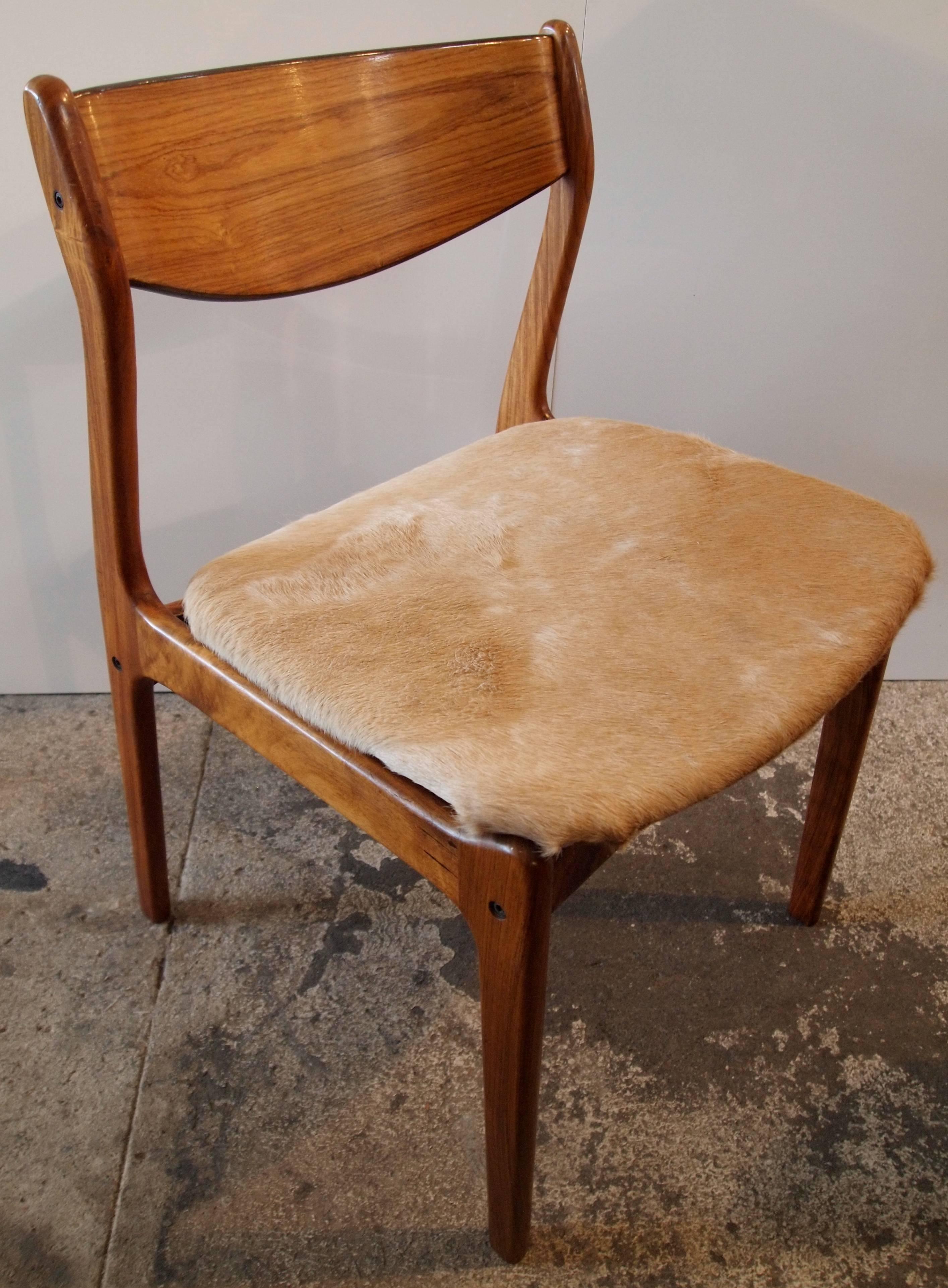 Danish Mid-Century/modern side chair made of Brazilian rosewood with upholstered seat.