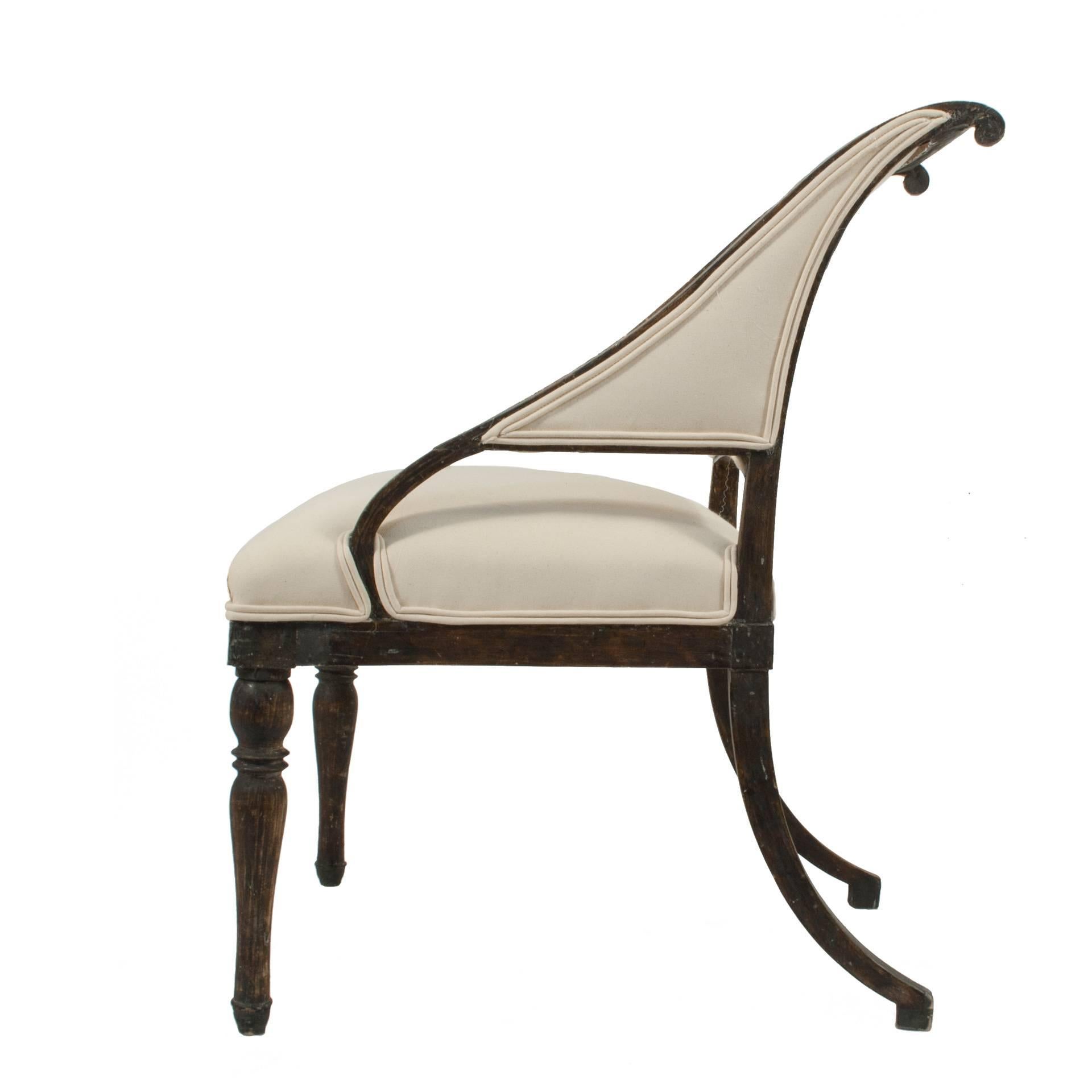 Gustavian lounge chair signed by Ephraim Stahl (1767-1820) in a worn black patina.