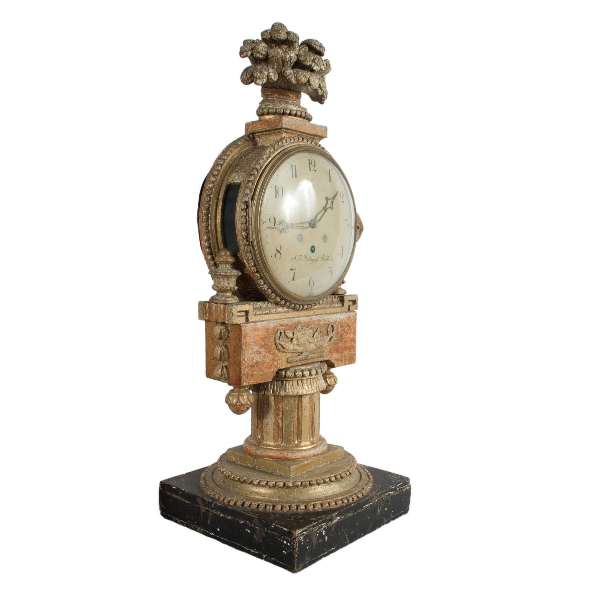 Gilded Gustavian table clock by A. F. Malmqvist.