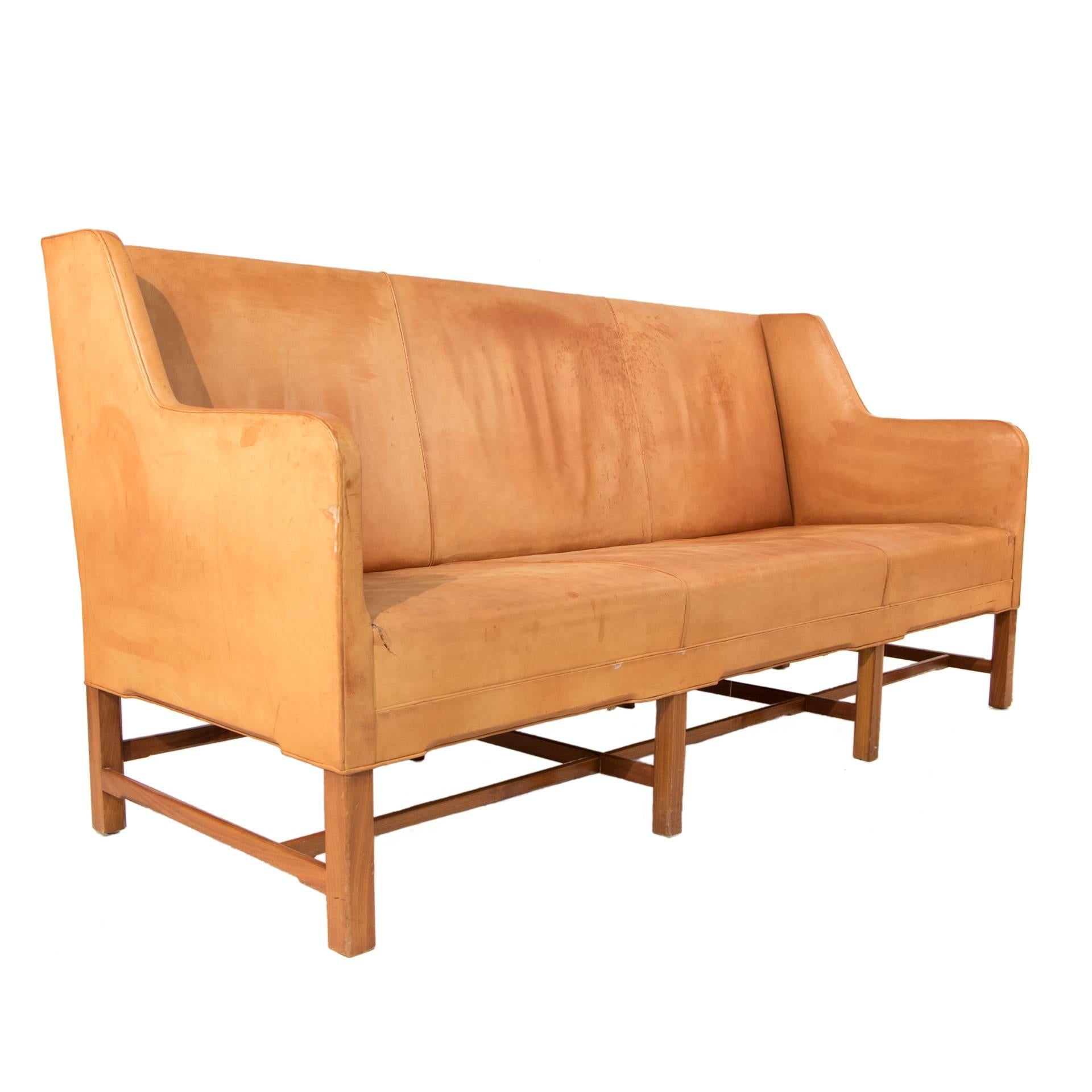 Leather sofa by Kaare Klint.