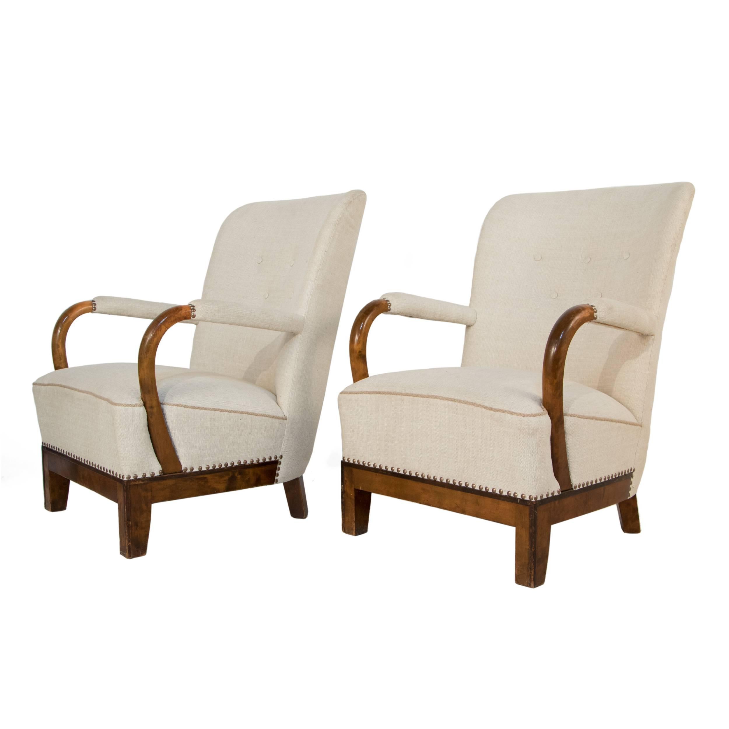 Pair of Swedish grace lounge chairs in birch.