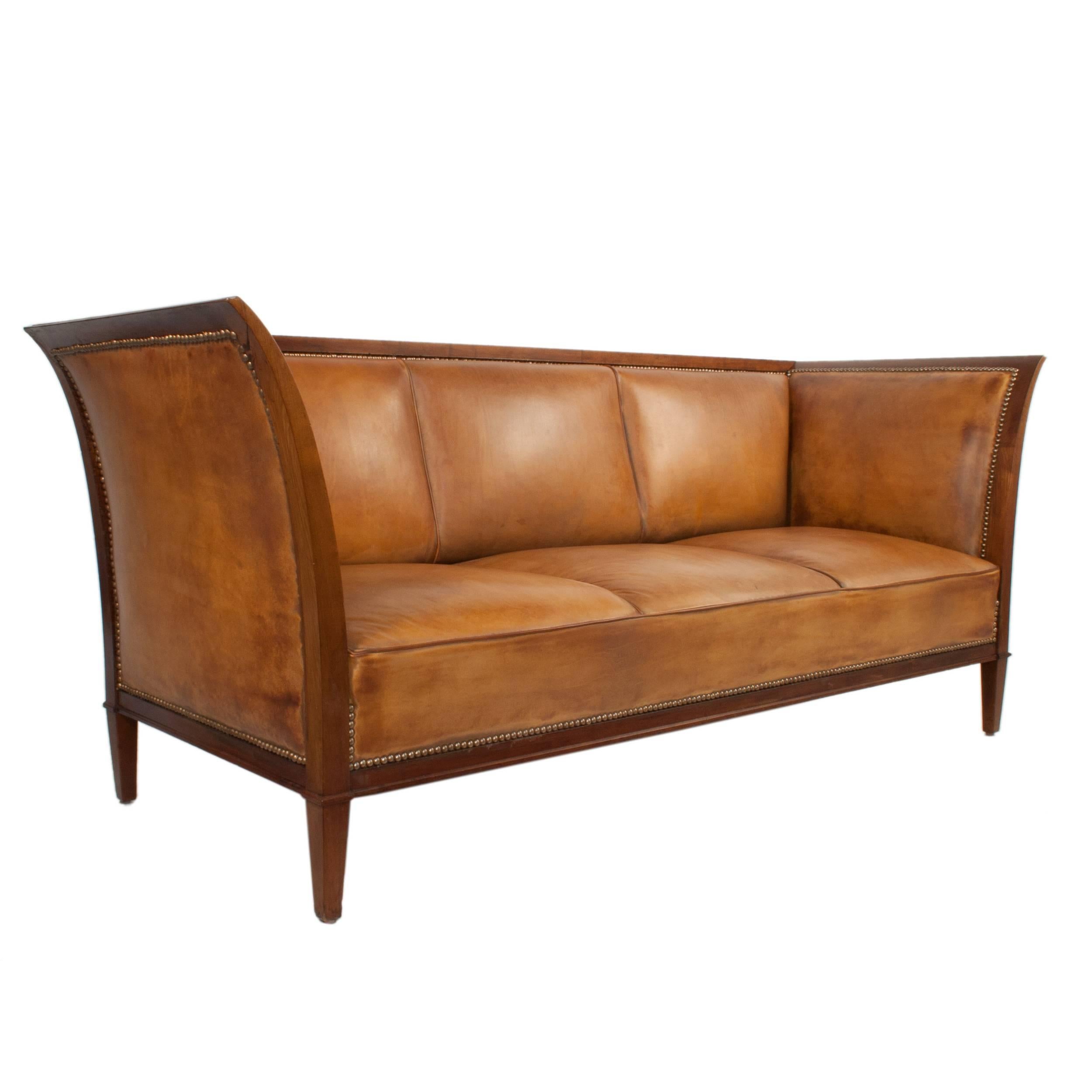 Leather and mahogany sofa by Frits Henningsen.