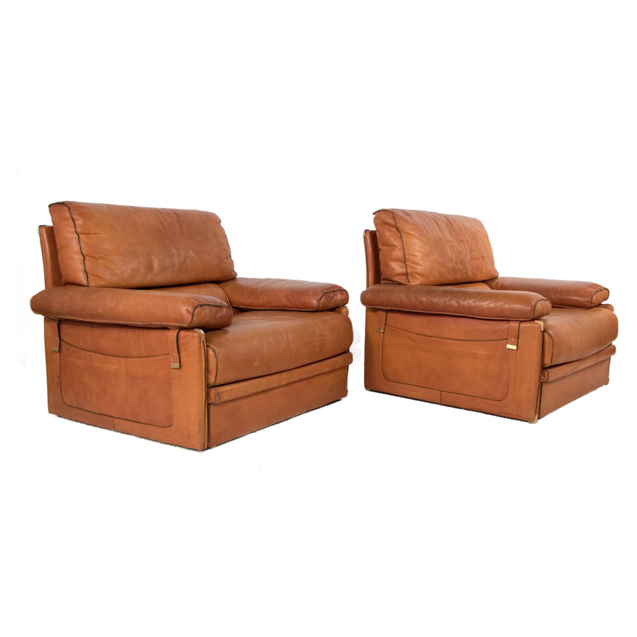 Pair of leather club chairs.