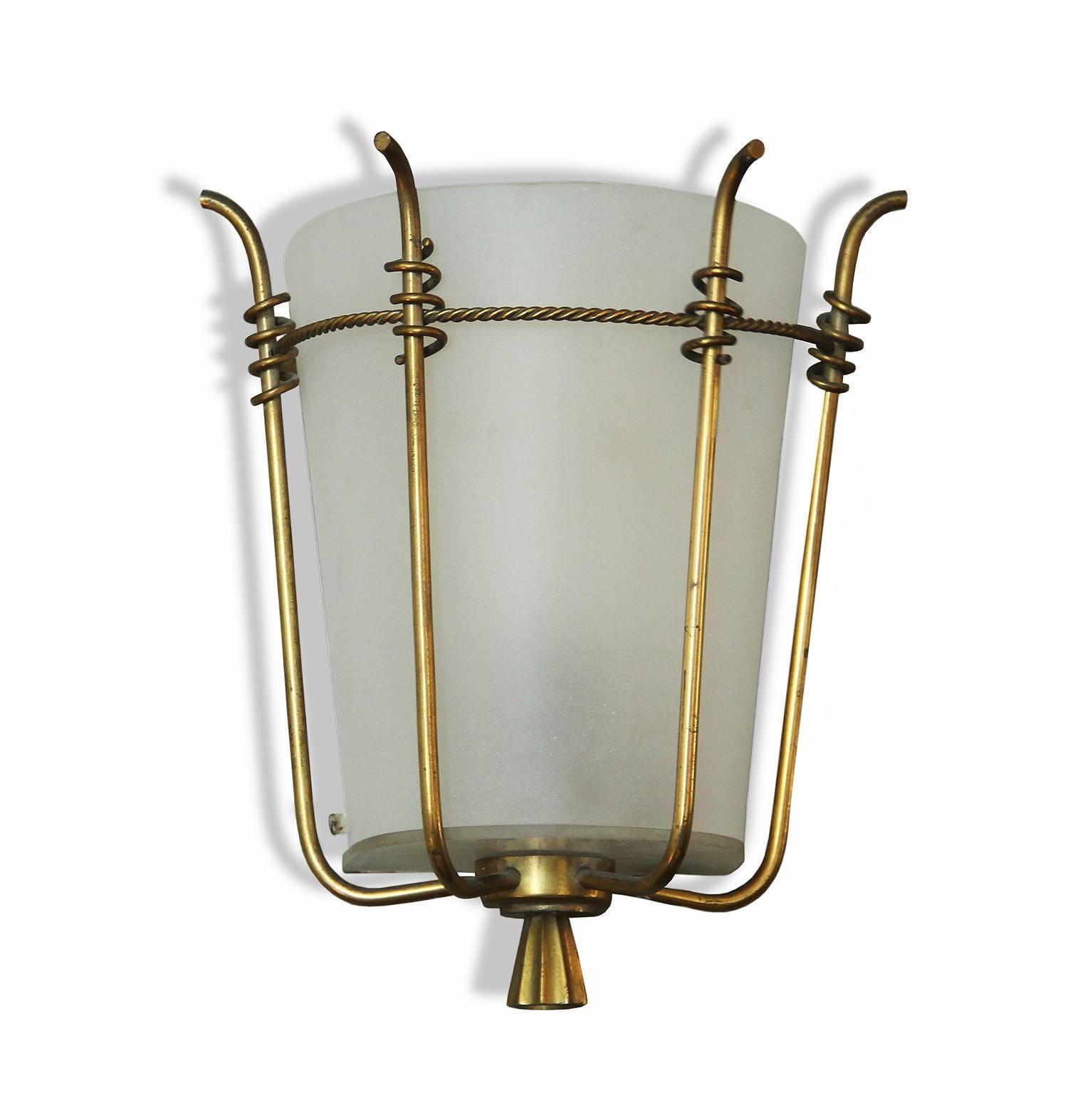 Marius-Ernest Sabino (1878-1961).

Very rare elegant and beautiful pair of sconces in brass with frosted glass and lacquered metal. Four brass arms encase the glass connected by a twisted brass rope.

Complete with an ornamental finial at the