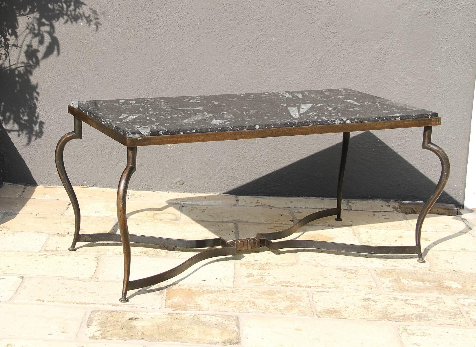 Michel Zadounaisky (1903-1983).

Very rare pair of 1930 Art Deco patinated wrought iron tables with a black fossils marble-tops.

An elegant and sophisticated model for a coffee table providing delicateness, simplicity, and class to any interior