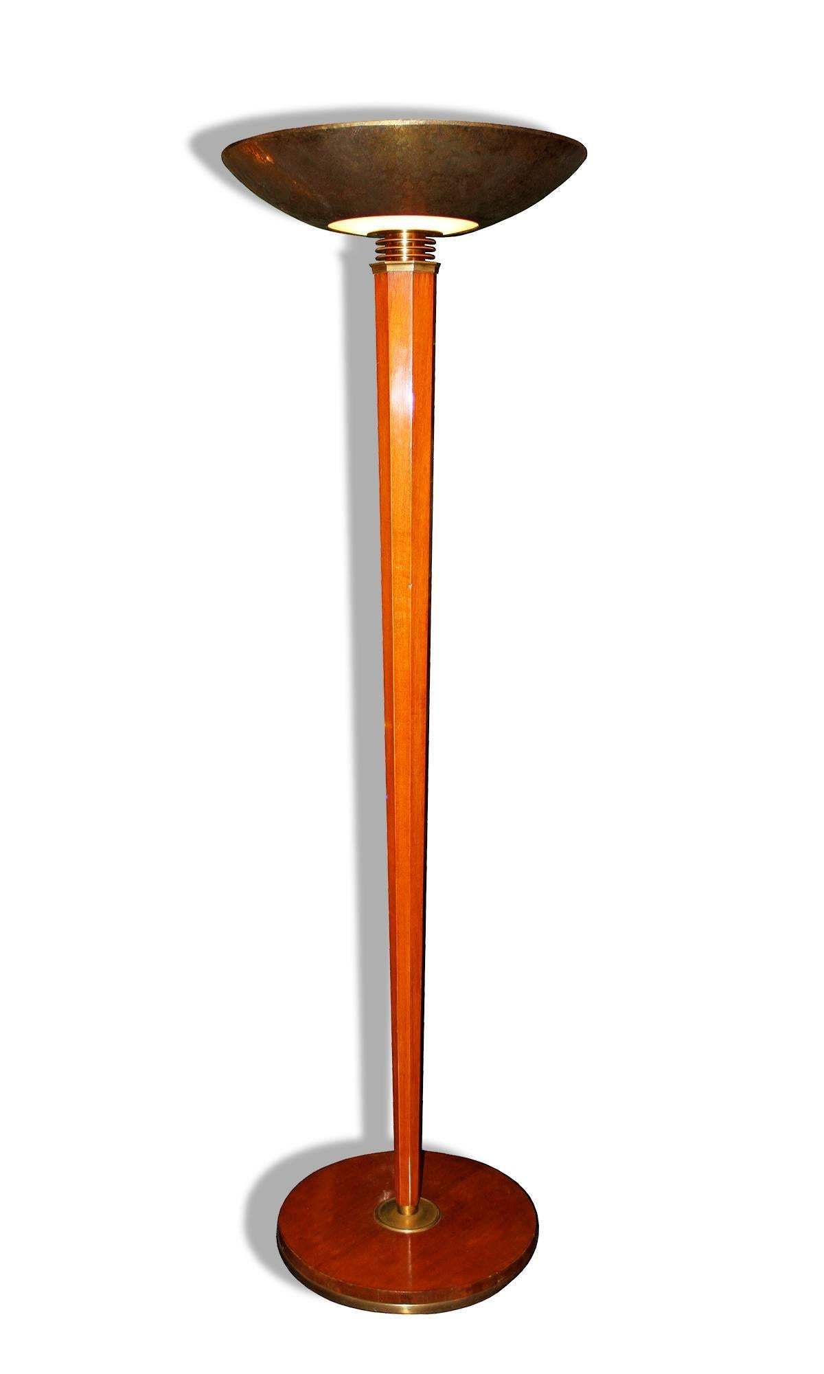 Philippe Genet & Lucien Michon for Dominique (André Domin & Marcel Genevriere).

Amazing Mahogany floor lamp by Genet & Michon for Dominique, France, circa 1945-1950.
Mahogany veneer applied on an octagonal column, base in mahogany circled by a