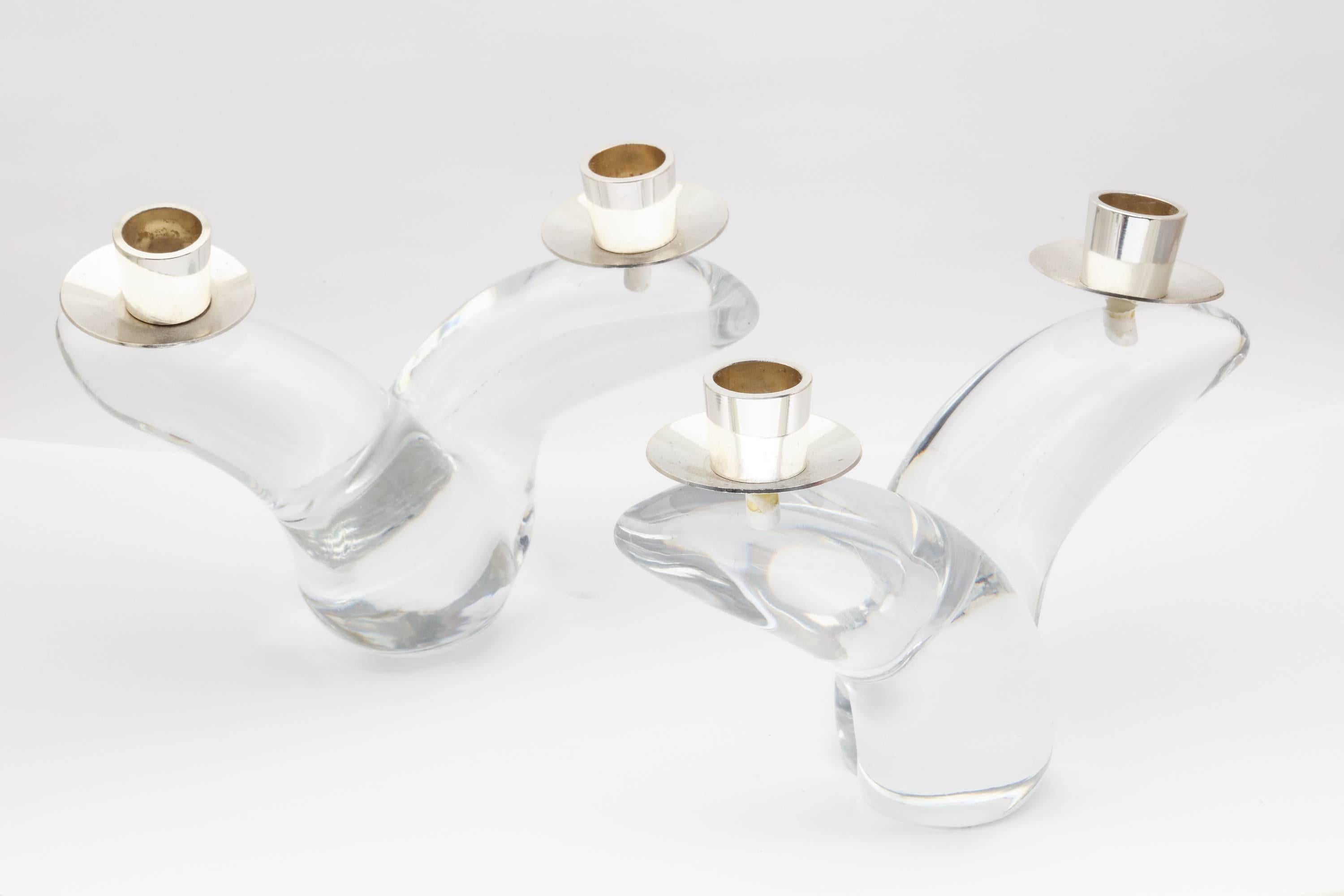 A pair of organic free-form blown glass and silver plated bobeche.