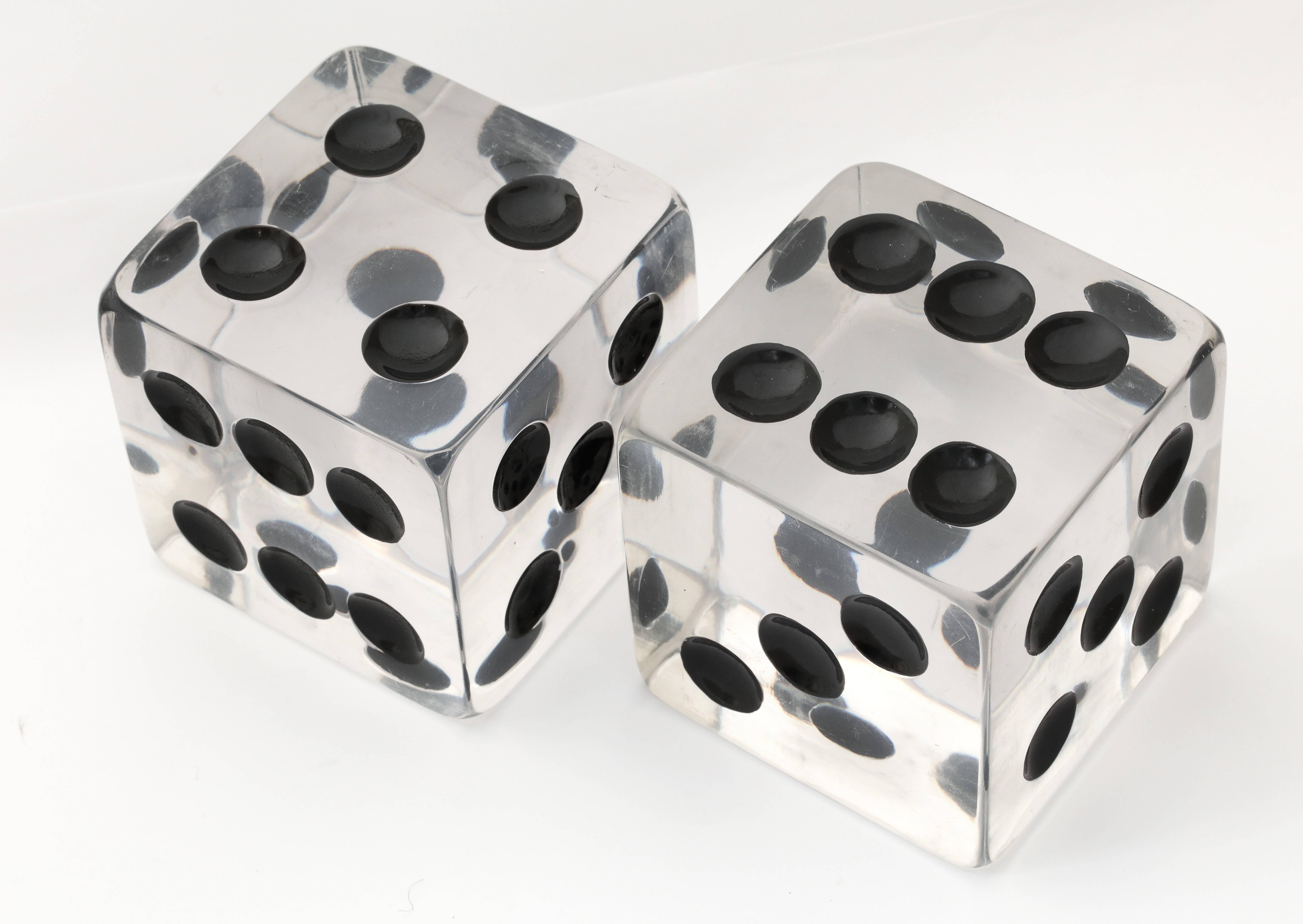 A lucky pair of large dice that work as paperweights or bookends.