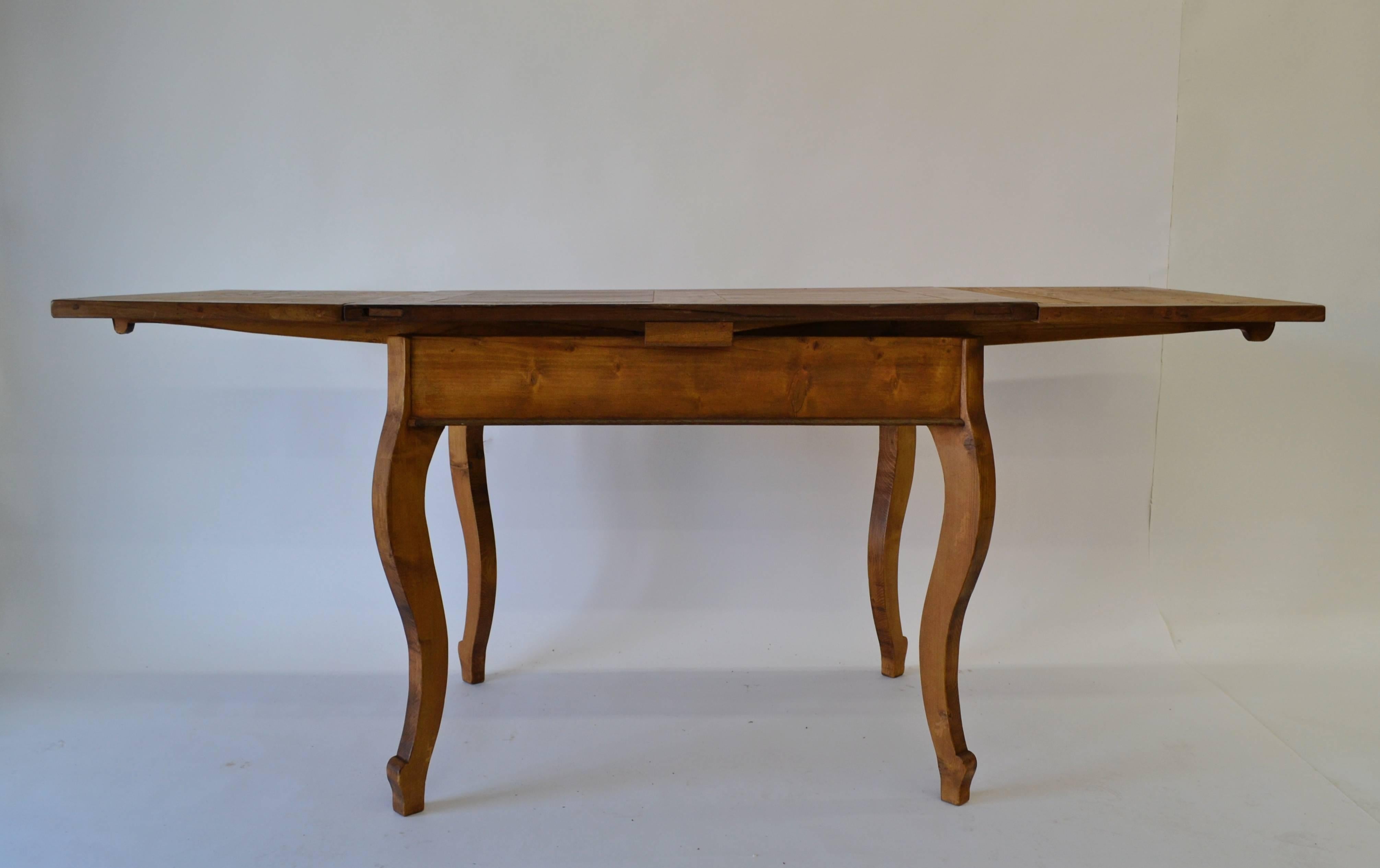 draw leaf table with a tapered leg