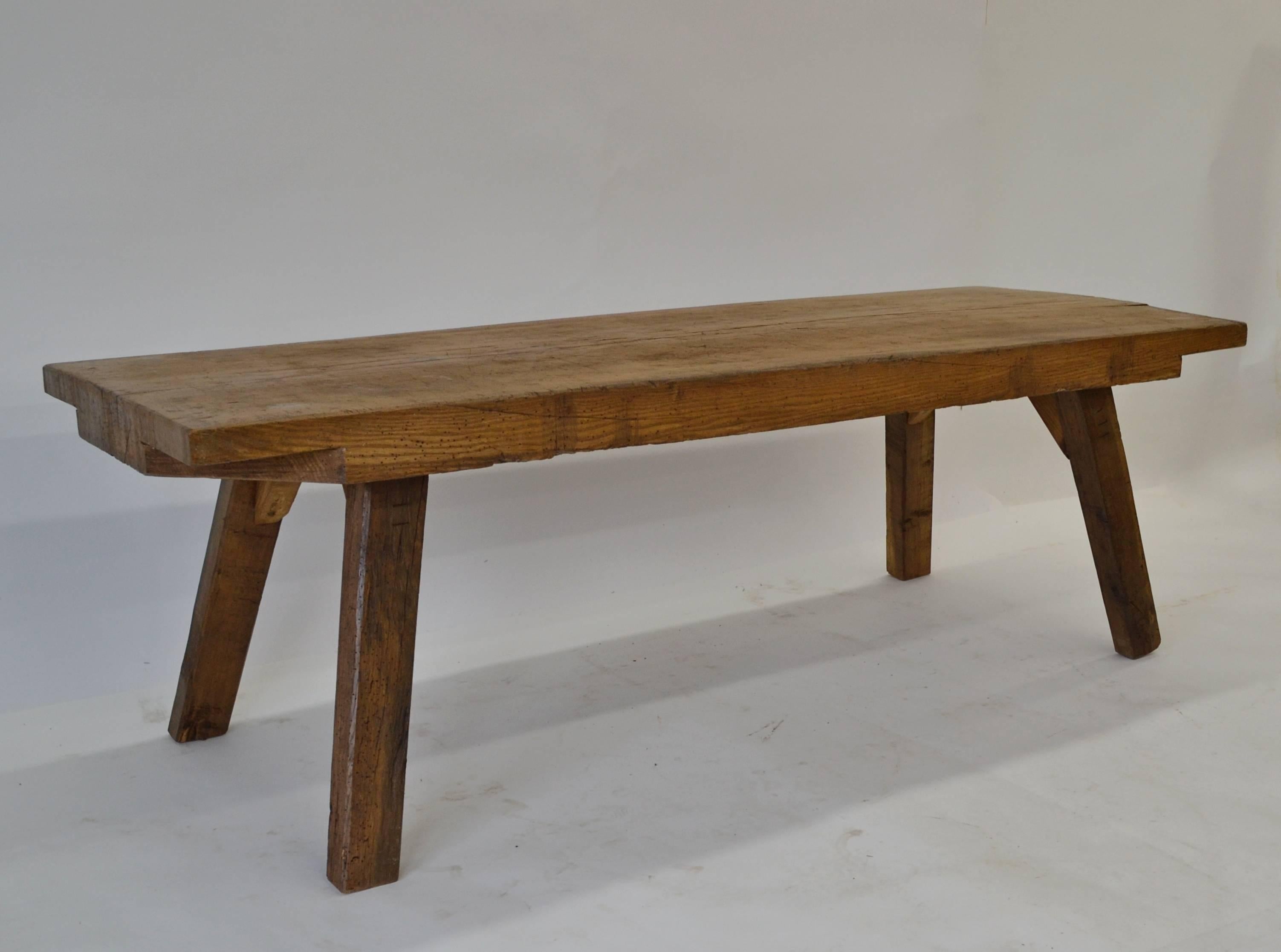 This is an outstanding cut down pig bench; one of the best we’ve ever had. Its 3” thick top, from a single board of oak, is scored, scratched and “dinged” all-over but it has never been subjected to heavy chopping so, at 20” high, is perfect as a