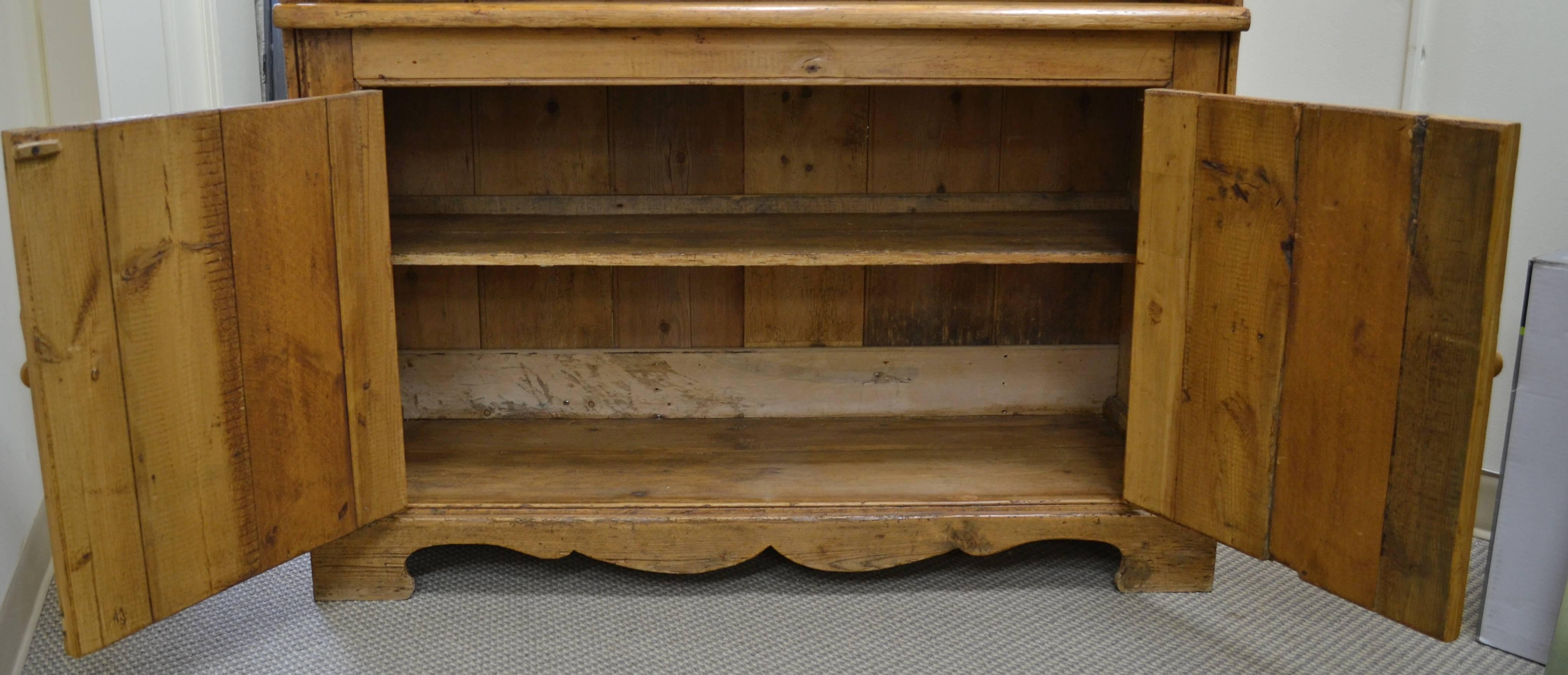 If you love the unique character and functional simplicity of antique Irish pine, then here is the perfect piece for storage and display. This is a splendid pine one piece open rack dresser from Co. Mayo in almost totally original condition.
 A
