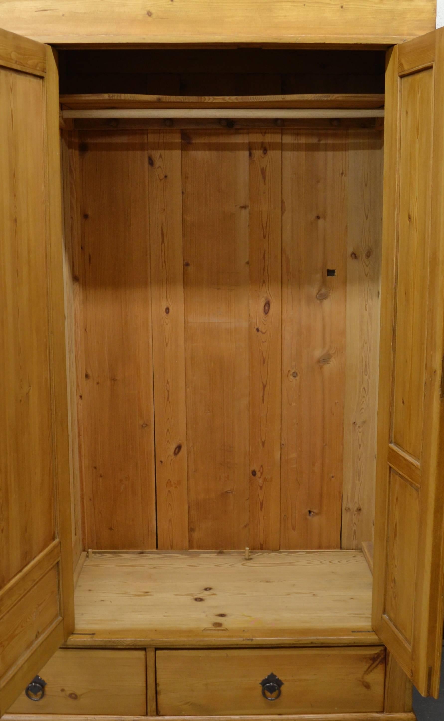 Polished Pine Three-Door Knock Down Armoire