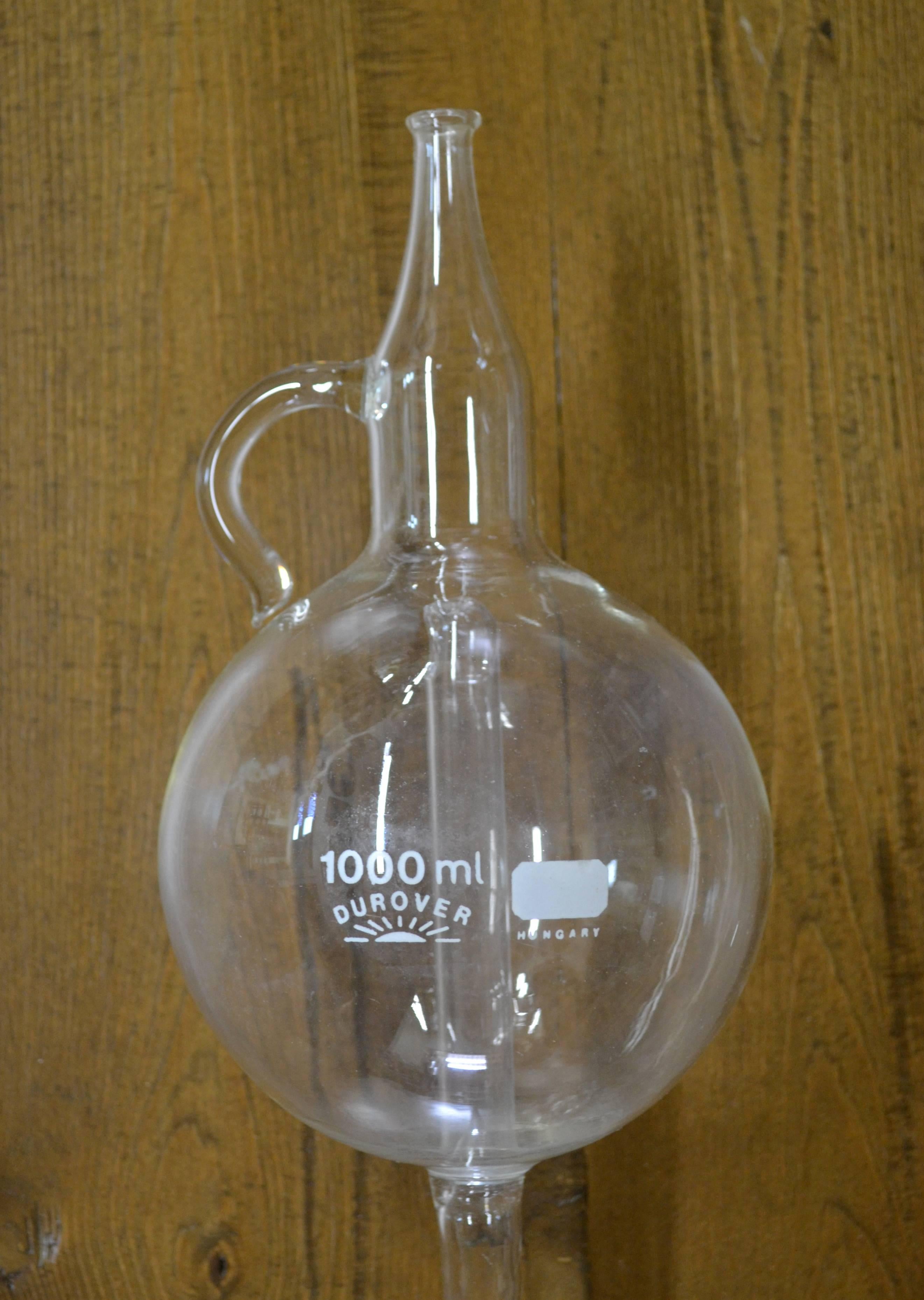 This is a 1000ml vintage hand-blown glass wine thief or calabash by Durover of Hungary, used for sampling wine from the barrel.  Insert the end into the side bunghole of a barrel laid horizontally.  Draw on the mouthpiece to siphon a sample into the