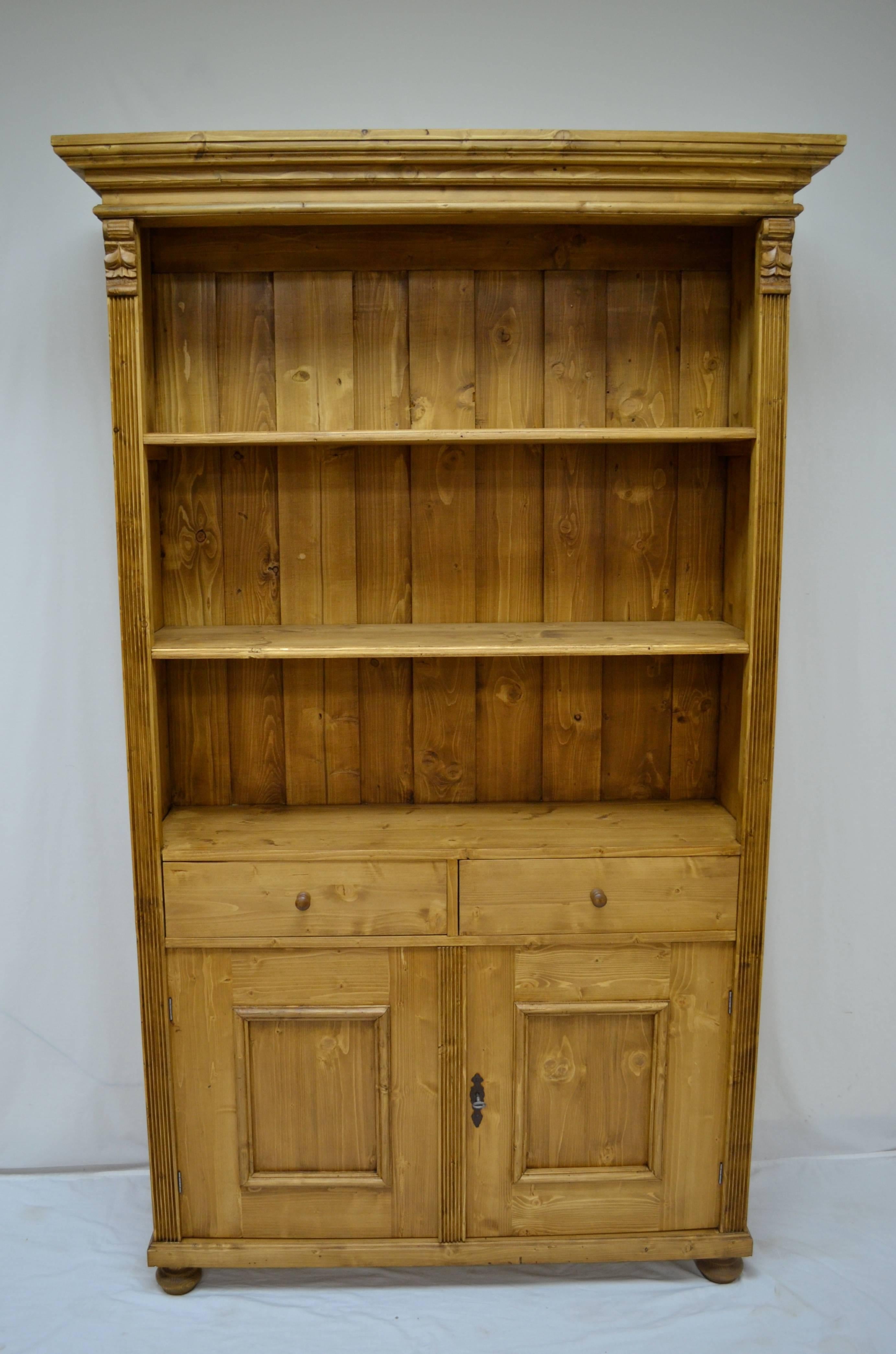 Antique pine bookcases can be hard to find and so can well-made reproductions. Using design features and methods of construction from our antique pine furniture, our workshop in Europe takes lightly-used reclaimed pine and fashions our reproduction
