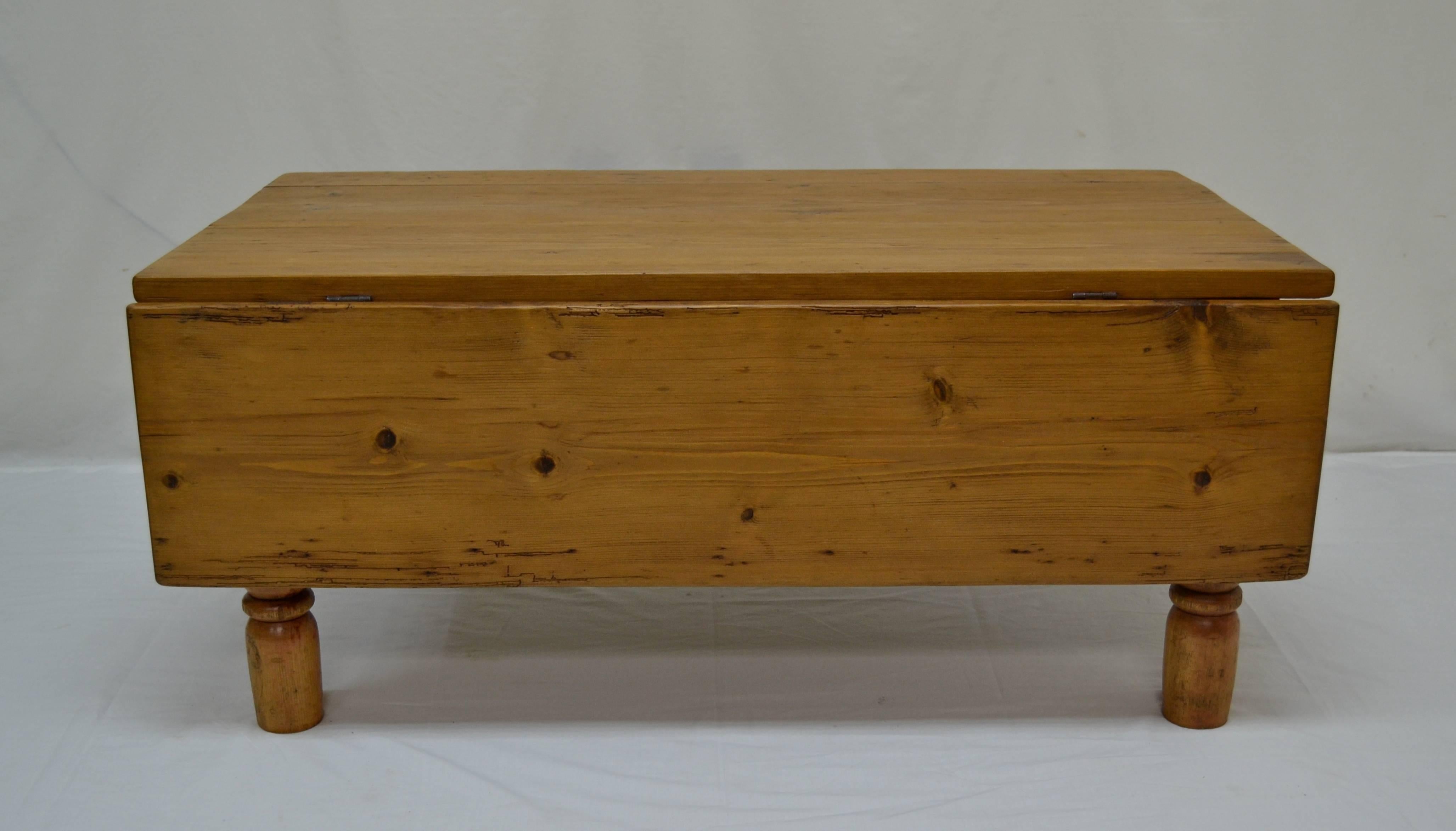It’s been a long time since we last offered one of these pretty little cut-down tables. It is an Irish pine table with a single drop leaf, cut down to 18” high for coffee table use. This piece bears all the beautiful features of journeyman-made