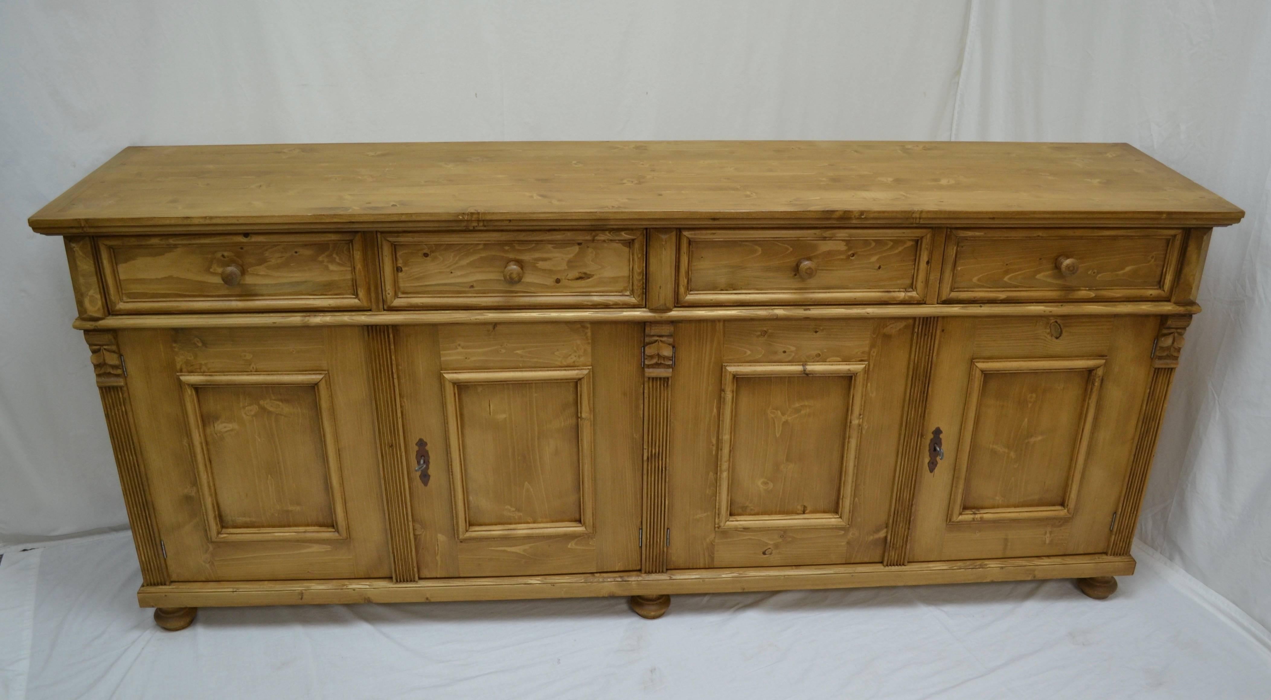 Antique pine sideboards can be hard to find so our workshop in Europe takes lightly-used pine to build this piece using traditional design features and construction techniques. 
This most versatile piece works well as a double vanity in the