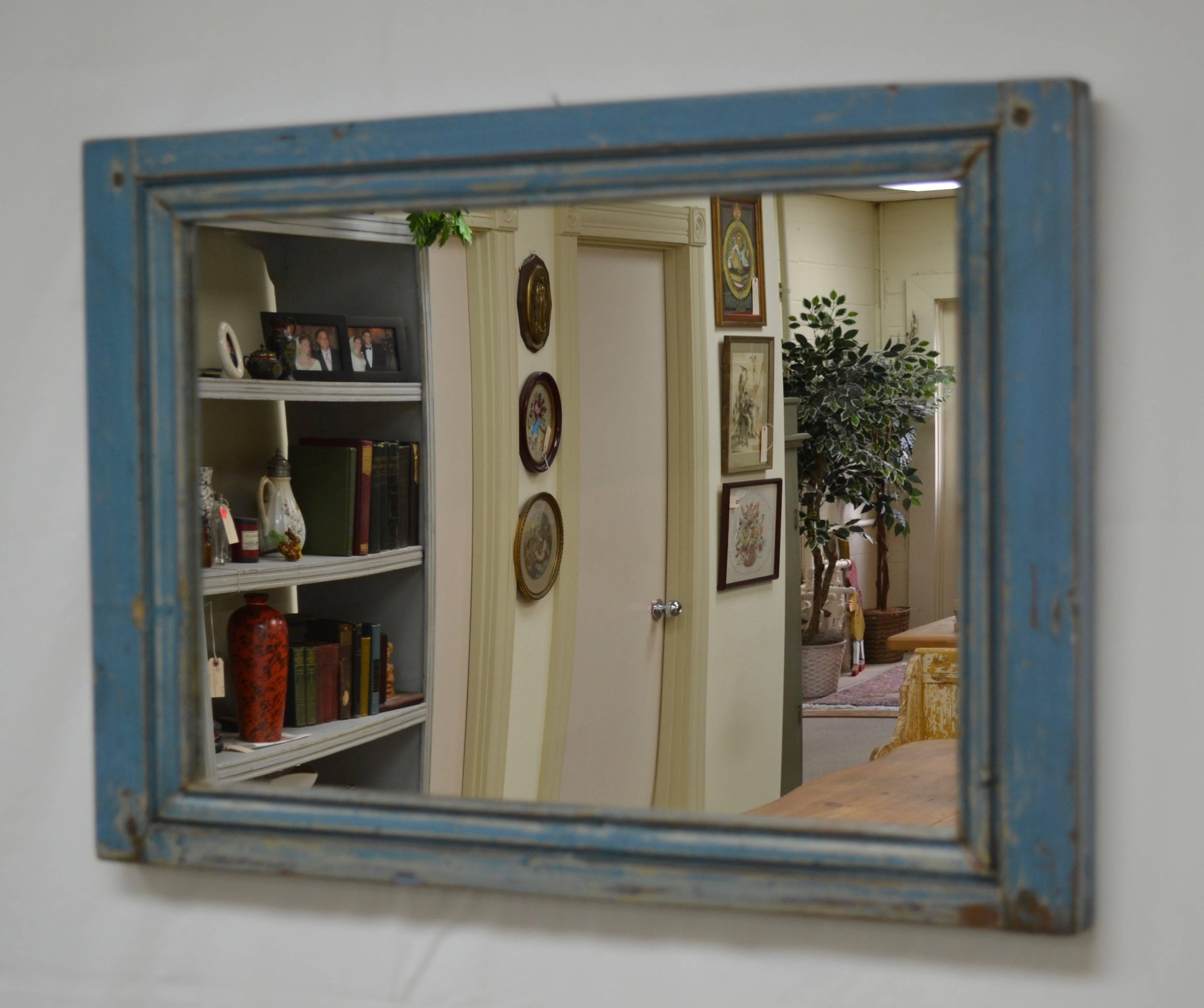 A 19th century pine paneled room in France has yielded a number of small frames in layers of old paint. These are rubbed down and sealed and fitted with new glass to create some interesting and attractive wall mirrors. These are great for a powder