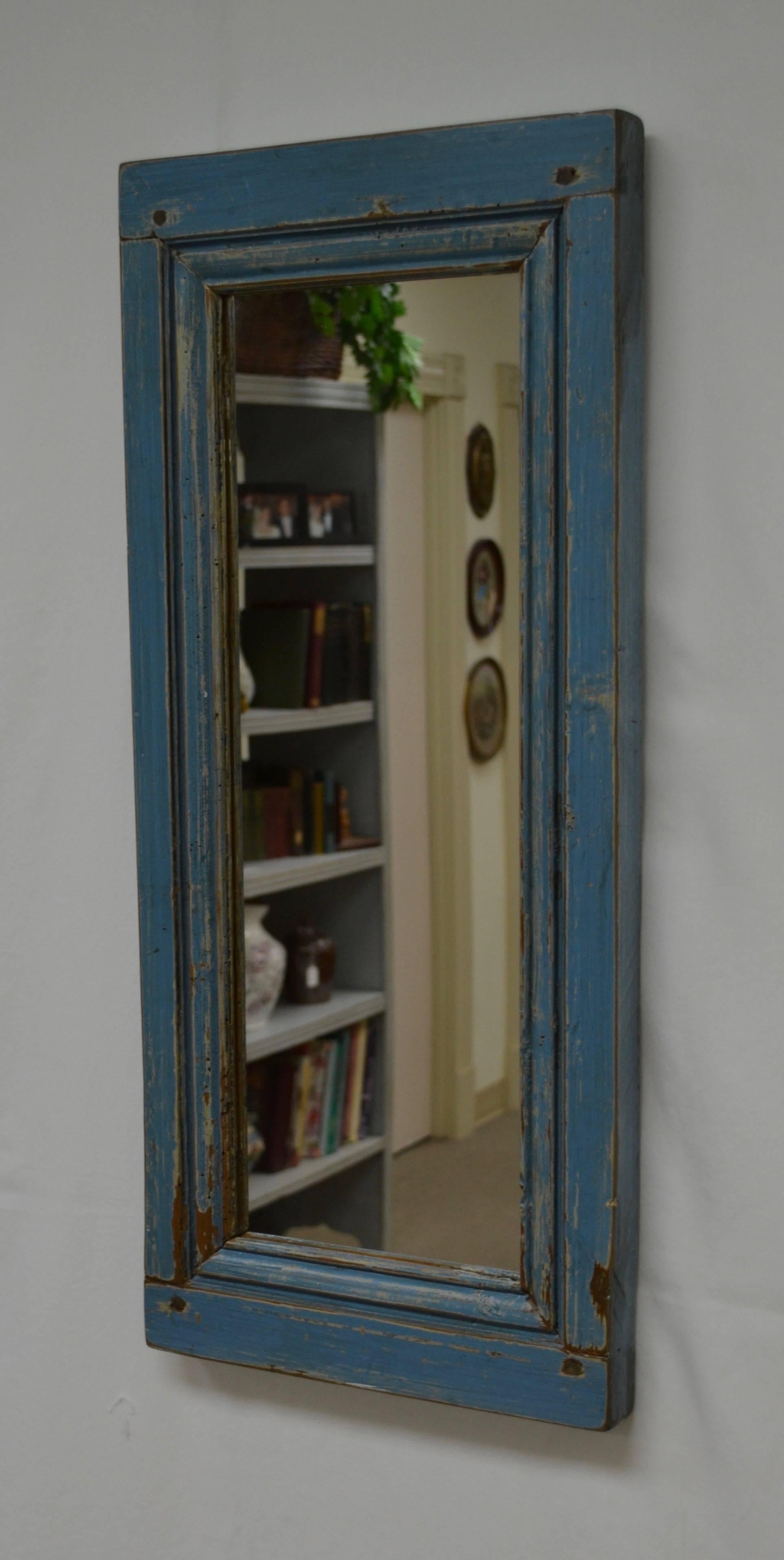 A 19th century pine panelled room in France has yielded a number of small frames in layers of old paint. These are rubbed down and sealed and fitted with new glass to create some interesting and attractive wall mirrors. These are great for a powder