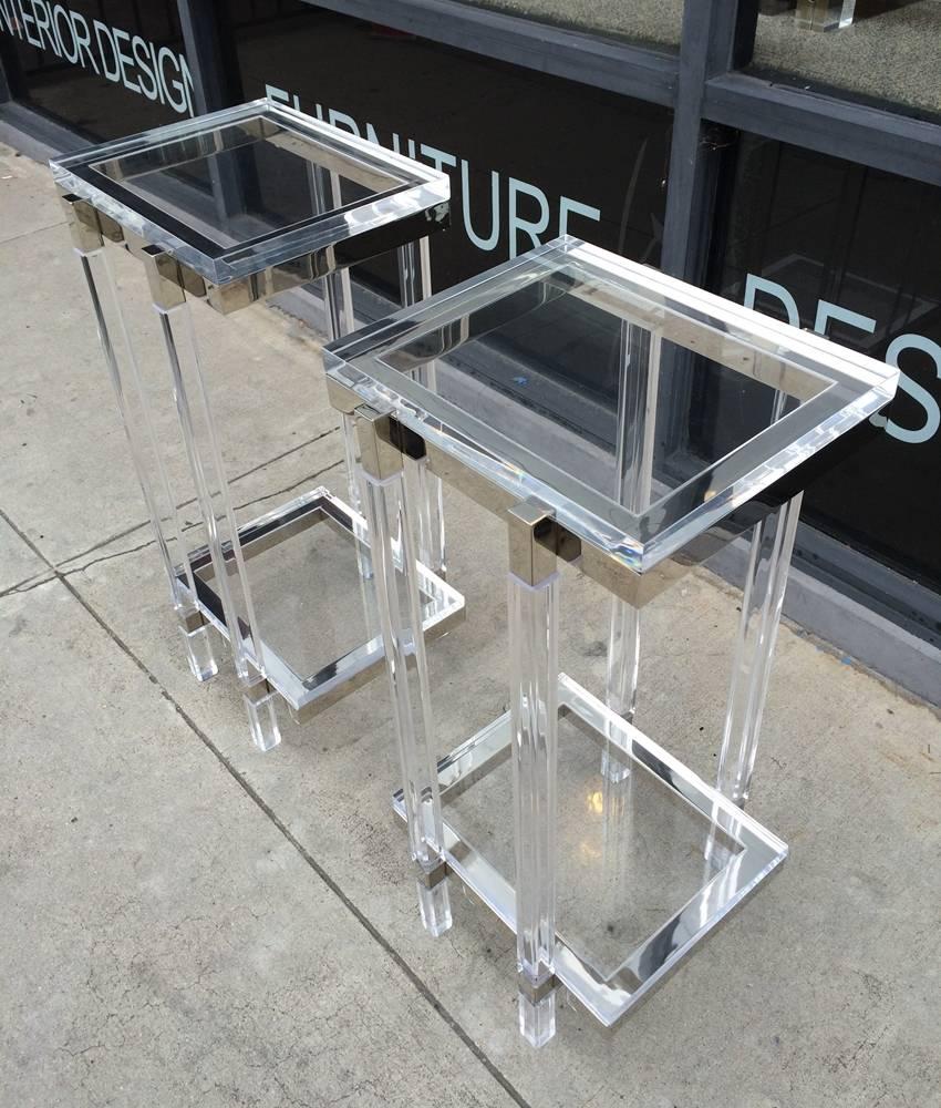 Beautiful set of tall side tables or pedestals in Lucite and nickel by Charles Hollis Jones.
These tables can be used in many configurations, the tops can be changed for long Lucite pieces to be used as console table or dressing table.

The