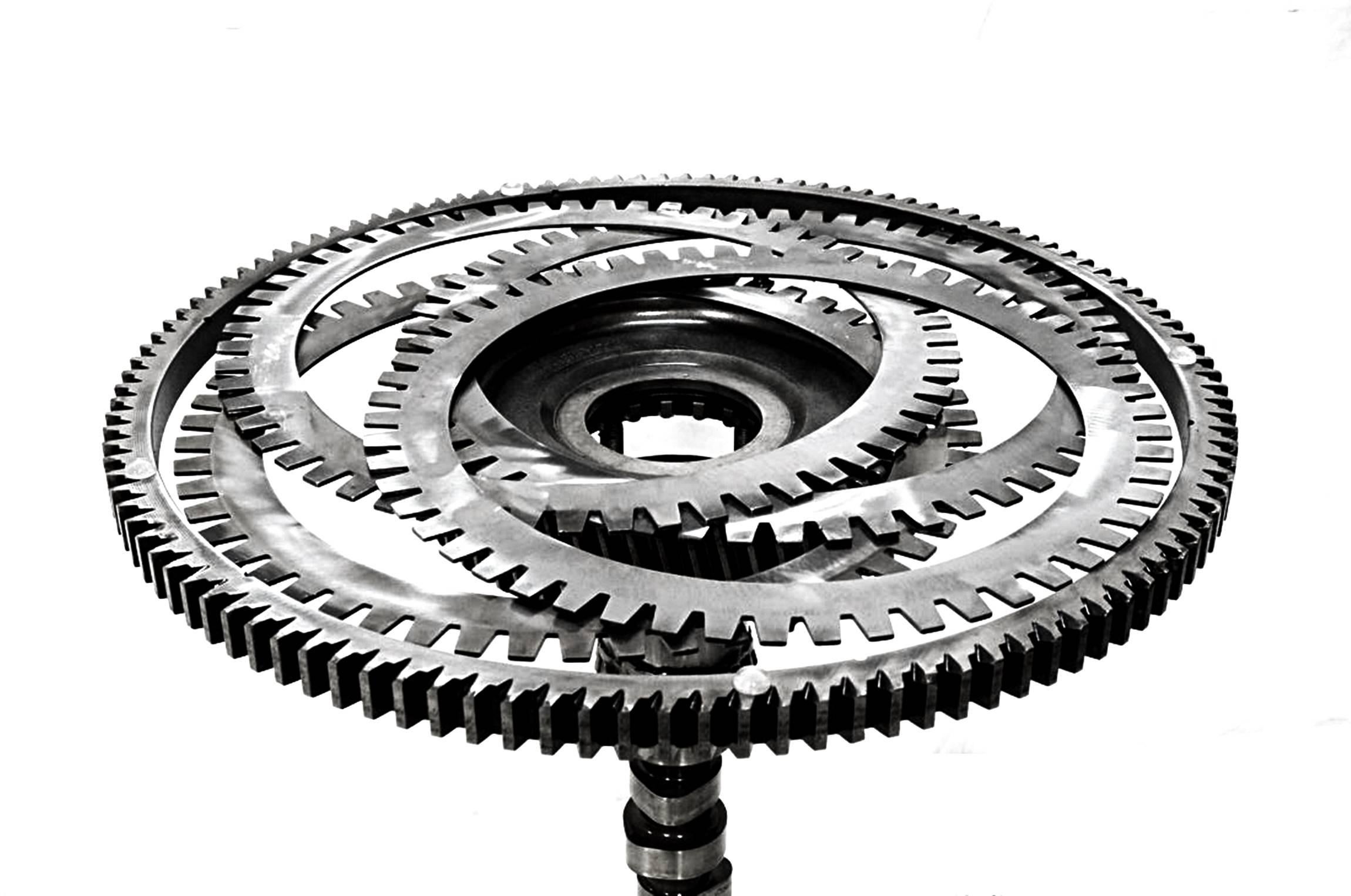Stunning center table designed and manufactured by Mexican sculptor Feliciano Bejar.
The table is made out of steel and gears from machinery that Bejar re-imagined into a sculptural table.

The piece is in excellent condition and ready to be